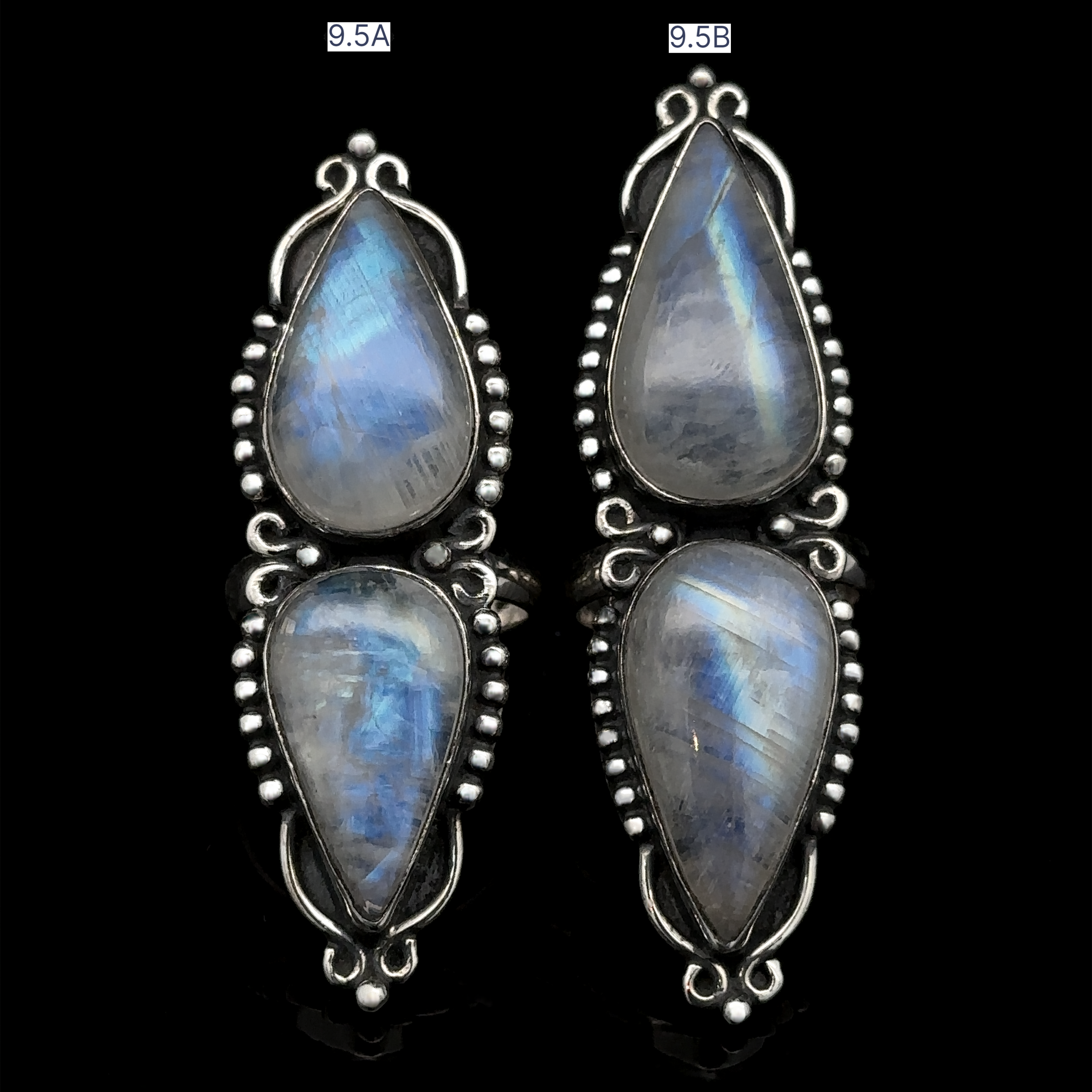 Two Long Double Teardrop Moonstone Rings featuring large teardrop-shaped moonstone gems, embellished with small silver bead details around the settings. Each statement ring has unique iridescent qualities in the stones.