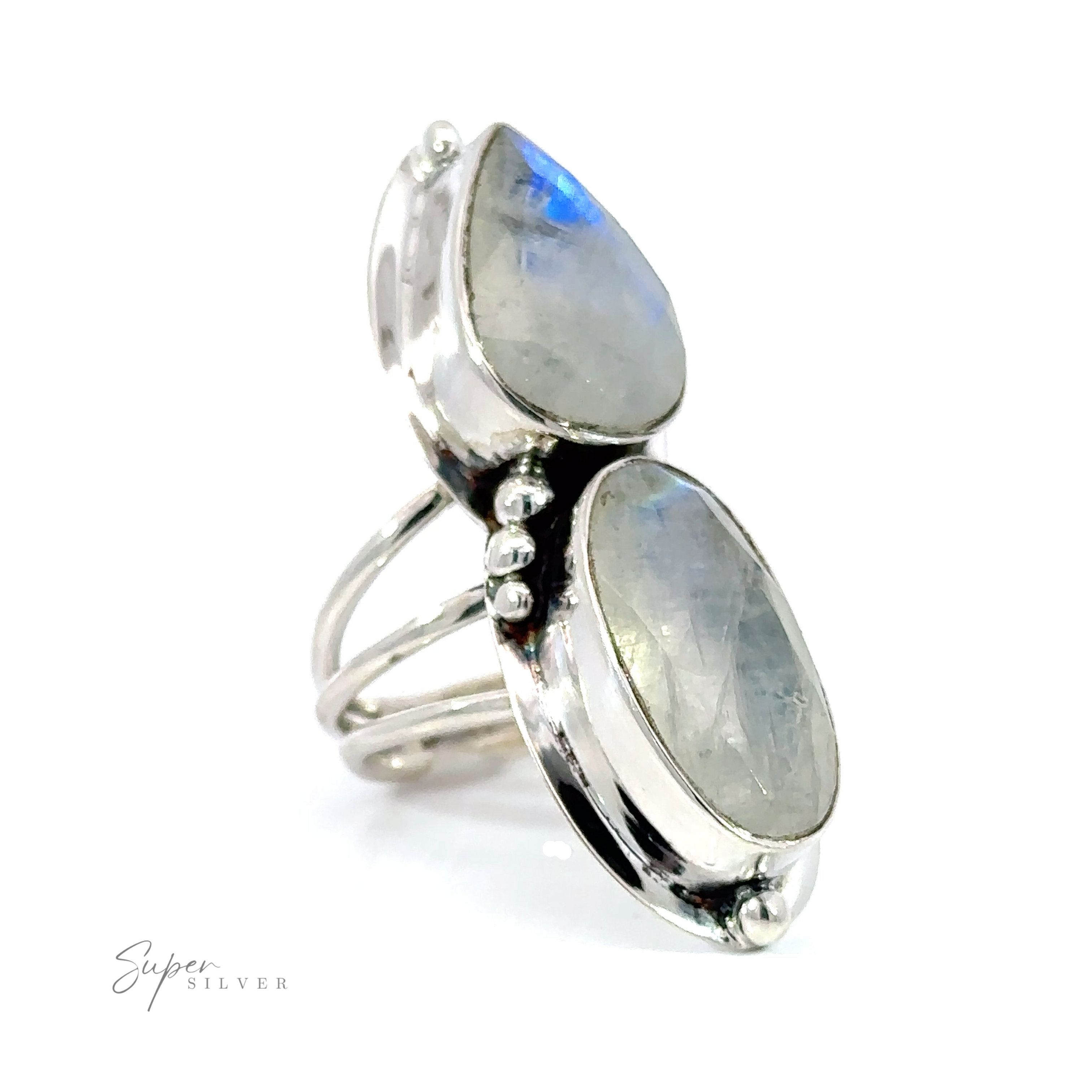 A stunning silver Statement Teardrop Moonstone Ring adorned with two mesmerizing moonstones.