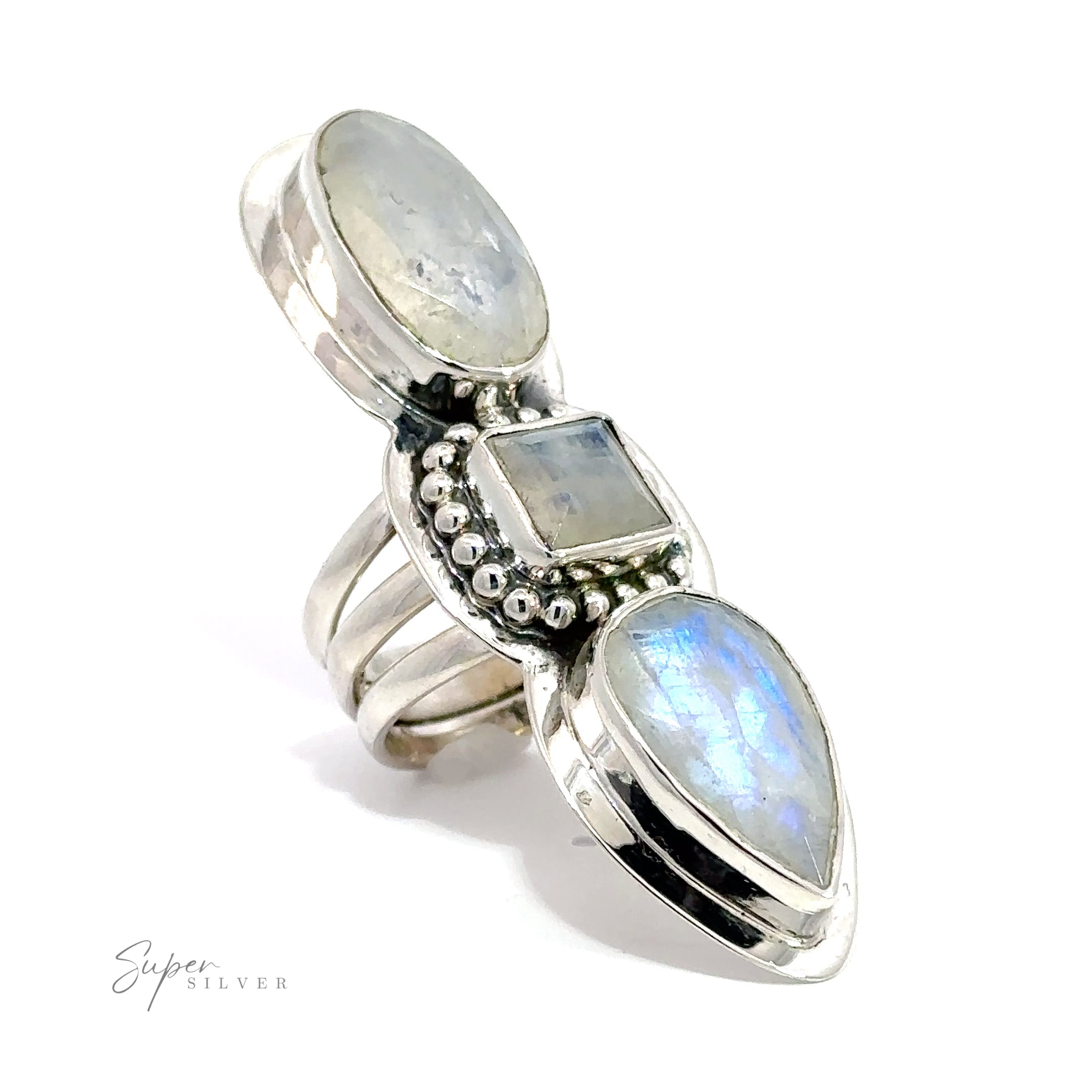 A silver ring with three stones and a Statement Faceted Moonstone Rings.