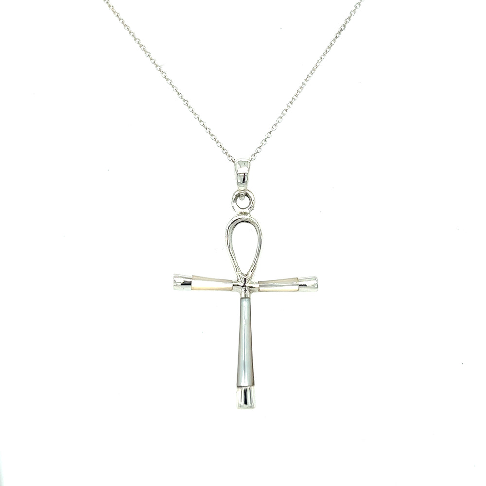 
                  
                    A stunning statement piece, a Super Silver Inlay Stone Ankh Pendant gracefully hangs on a sleek silver chain, capturing the essence of ancient Egypt.
                  
                