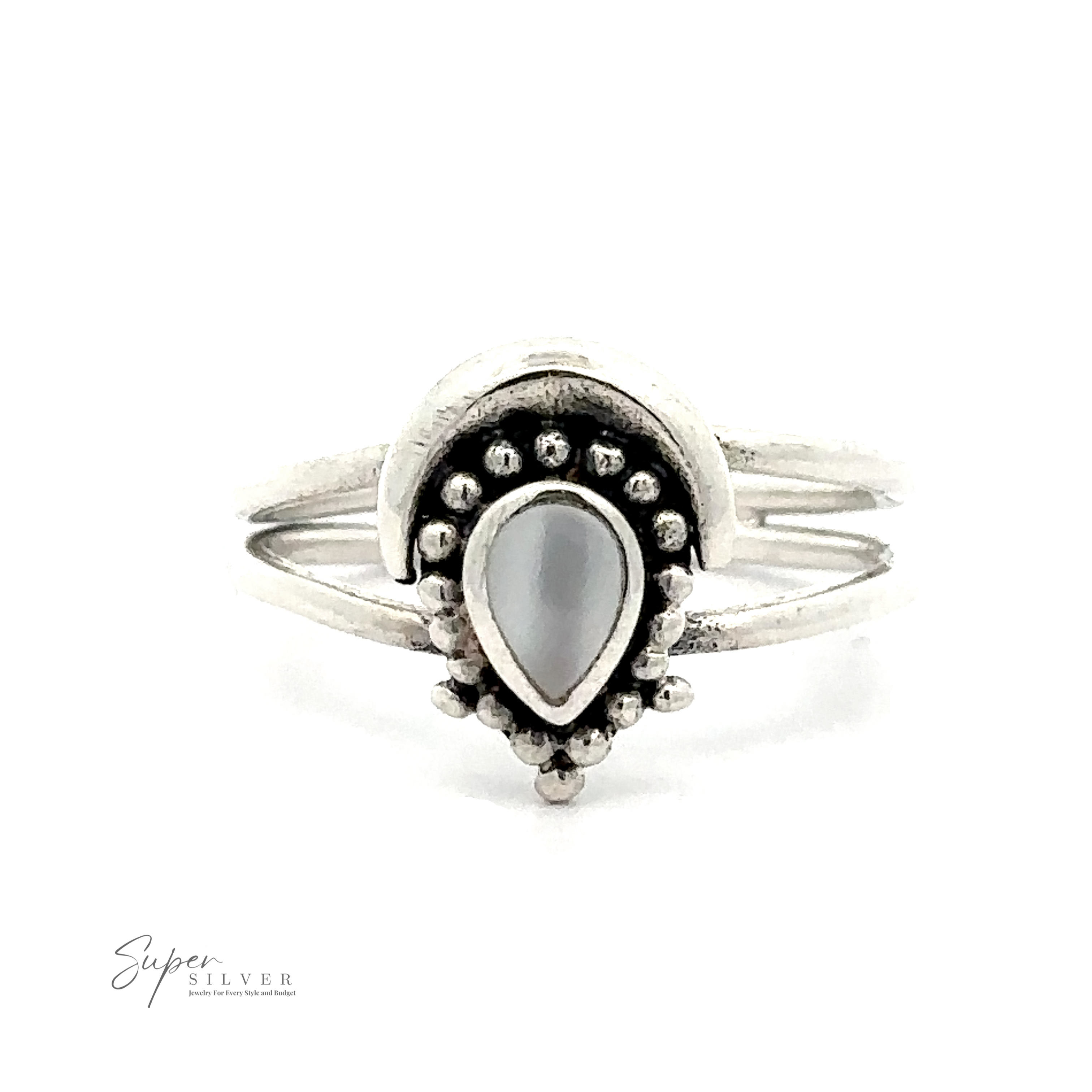 A silverwork jewelry masterpiece, this Teardrop Ring With Inlaid Stone and Crescent Moon features a pear-shaped white stone and exquisite decorative detailing on a white background. The ring boasts two thin bands, with the "Super Silver" logo visible in the corner.