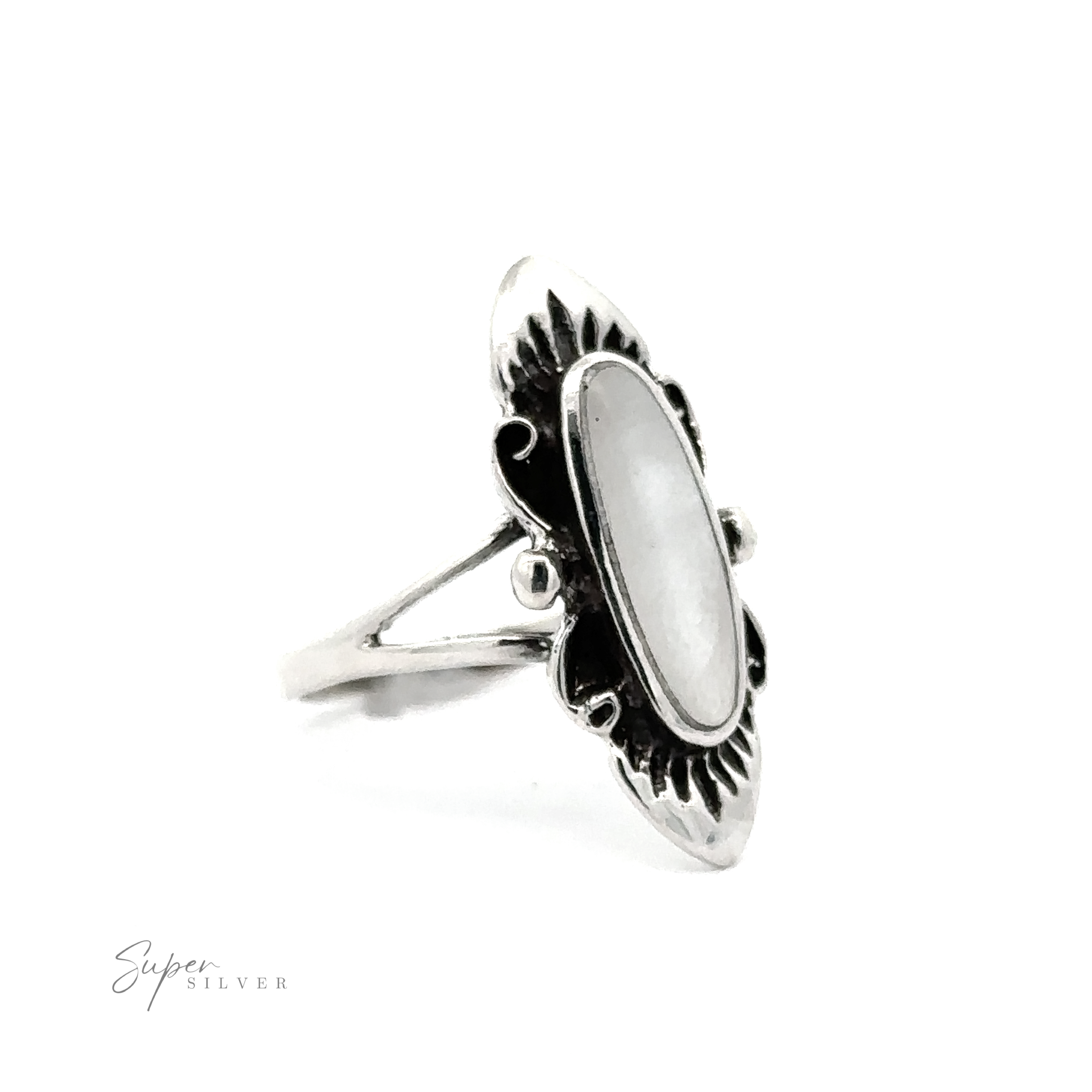 A fashionable Southwest Inspired Elongated Oval ring with an antique look on a white background.