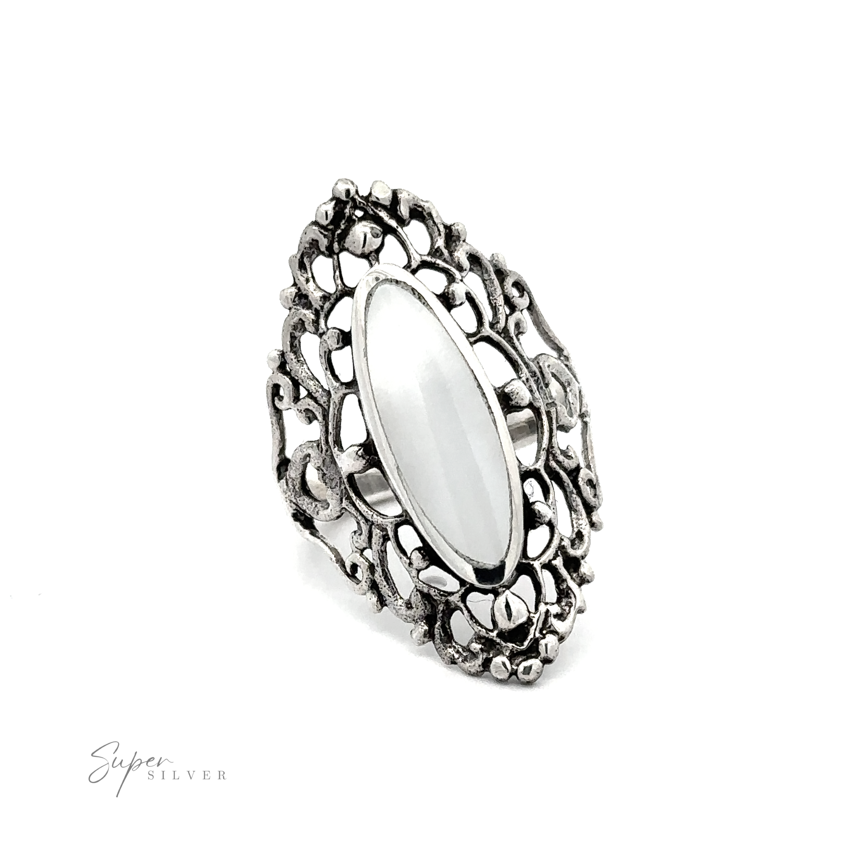 A Filigree Shield Ring with Inlaid Stones with a white stone.