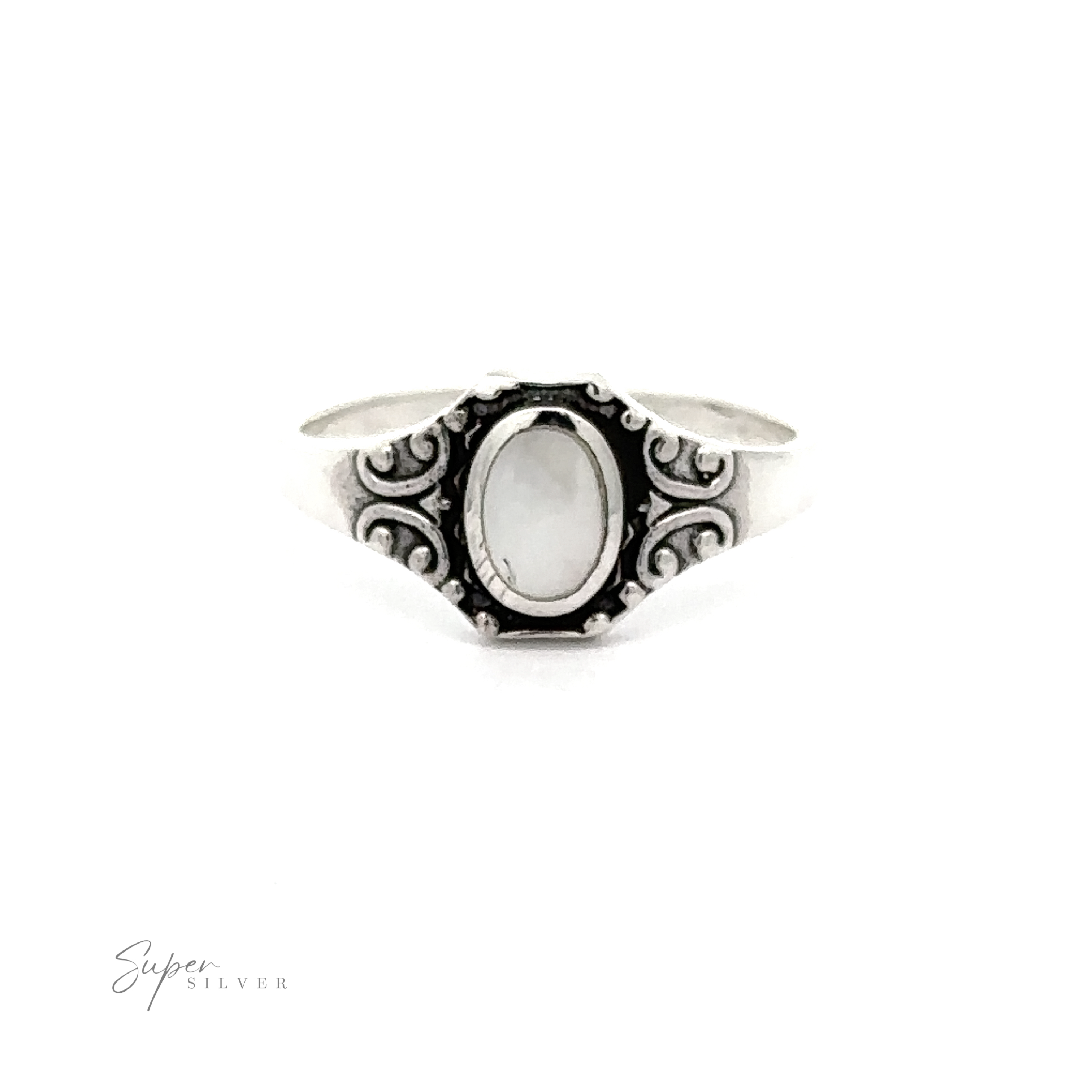 An Oval Inlay Stone Ring with Antiqued Filigree Design with a mother of pearl stone in a .925 sterling silver setting.