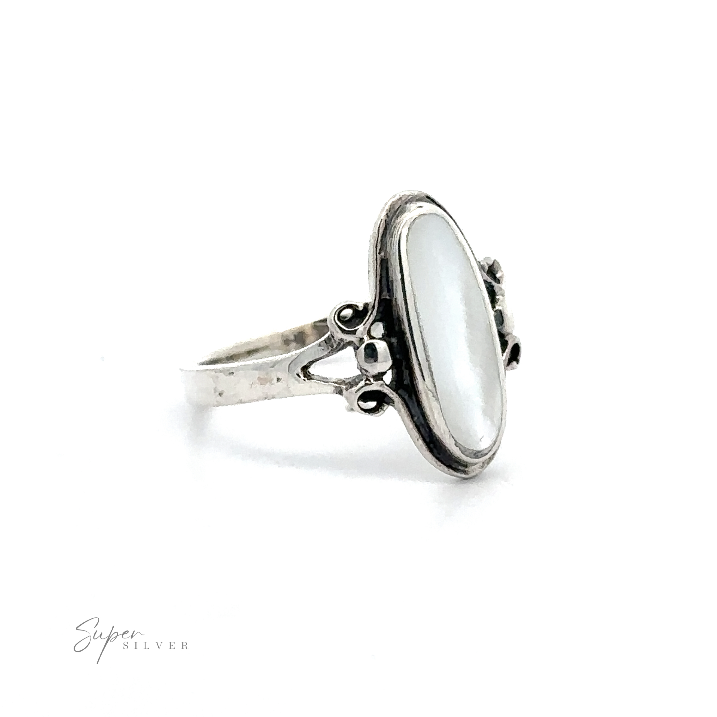 Sterling silver ring with a large Oval Stone Ring with Delicate Border and ornate band, displayed against a white background.