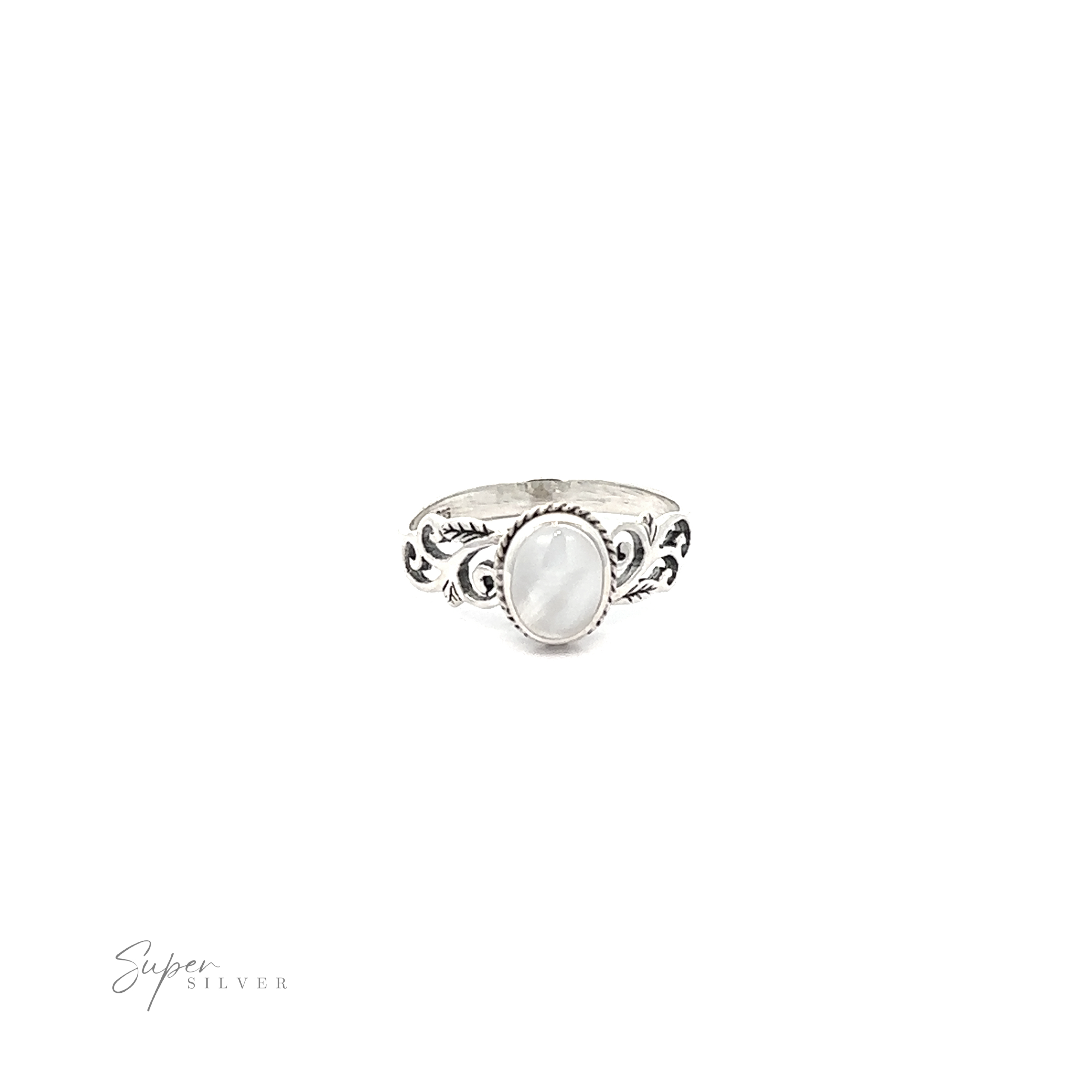 A Oval Inlaid Ring with Swirls and Leaf Detailing with nature detailing on a .925 Sterling Silver background.