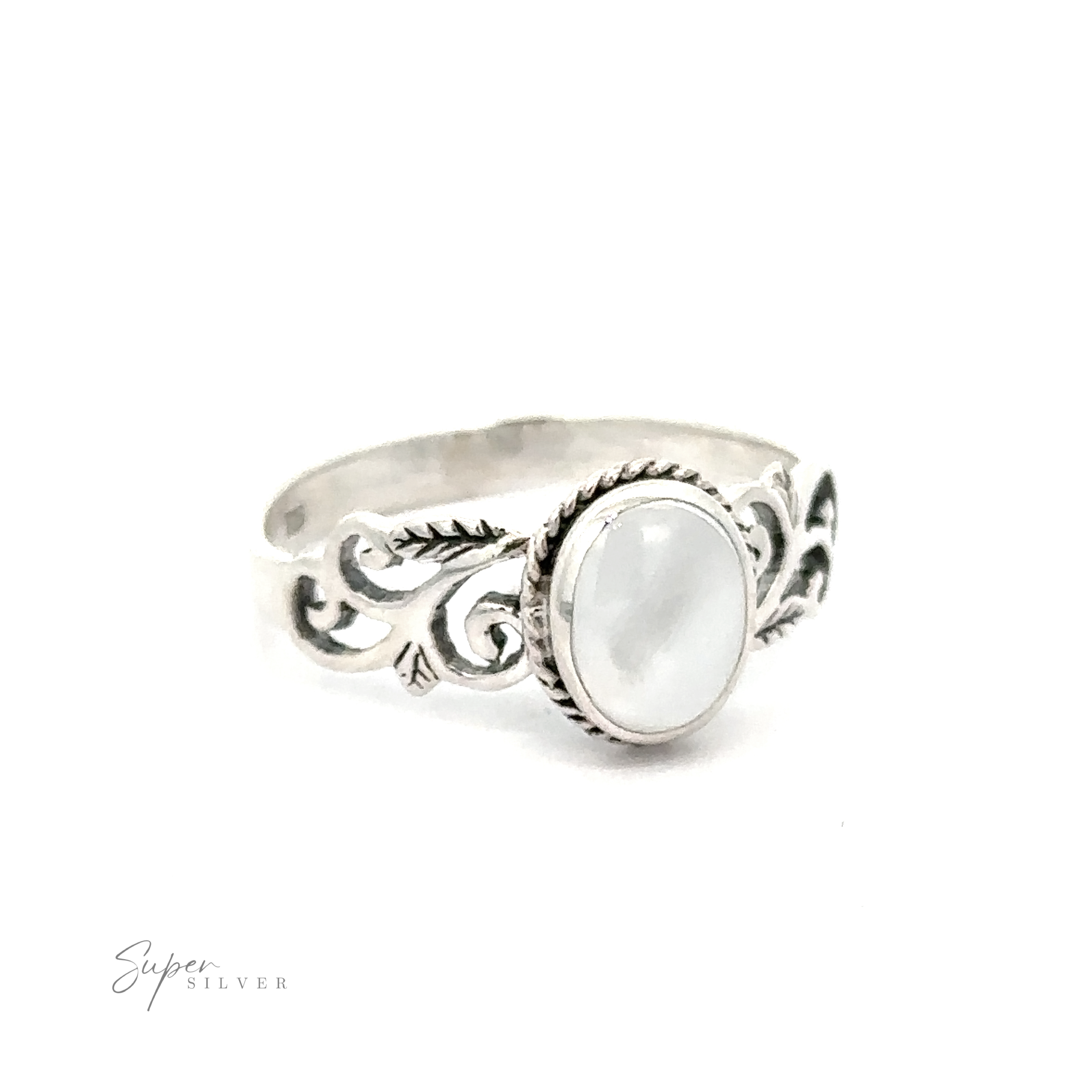 A silver Oval Inlaid Ring with Swirls and Leaf Detailing.