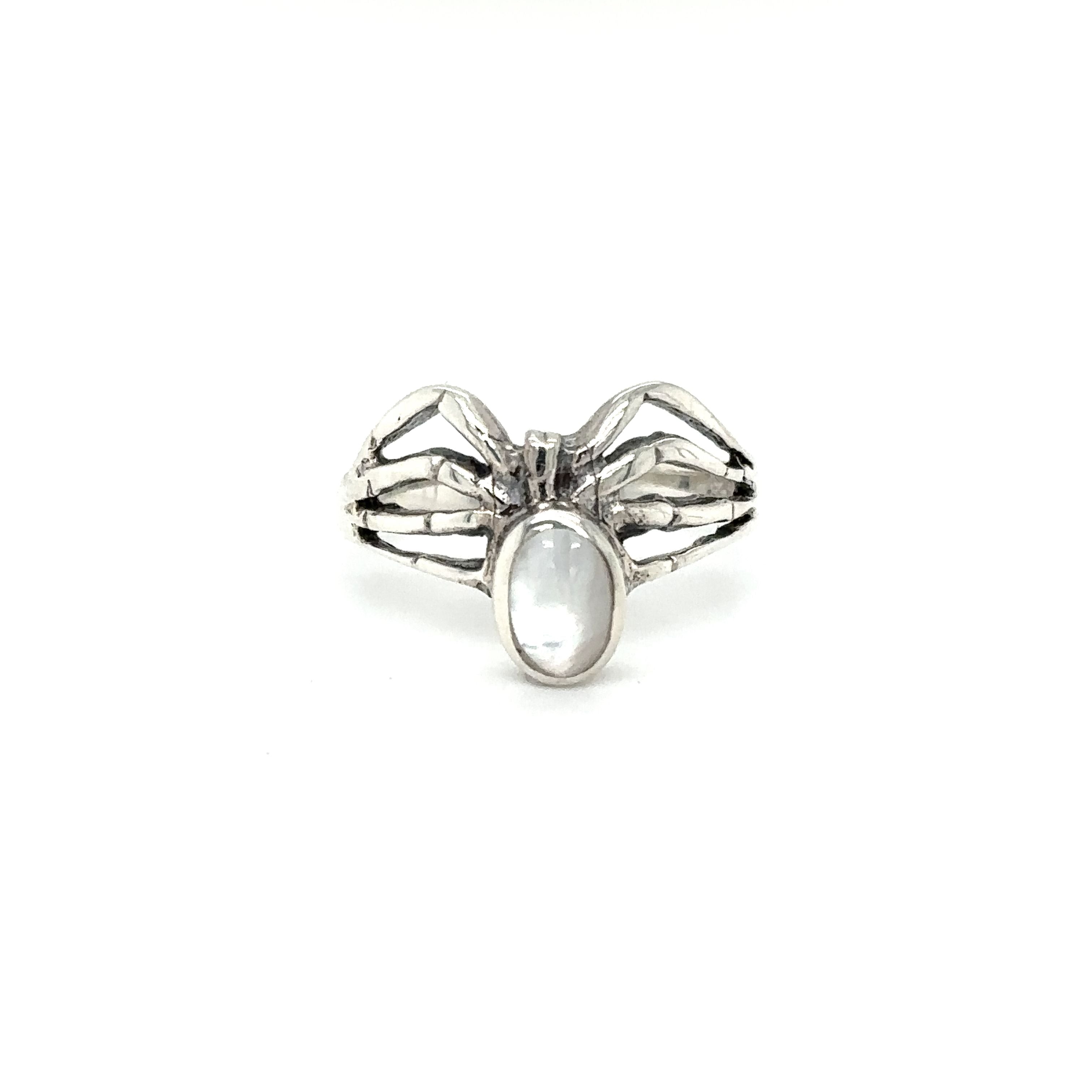 A Super Silver Inlay Stone Spider Ring with a white stone.
