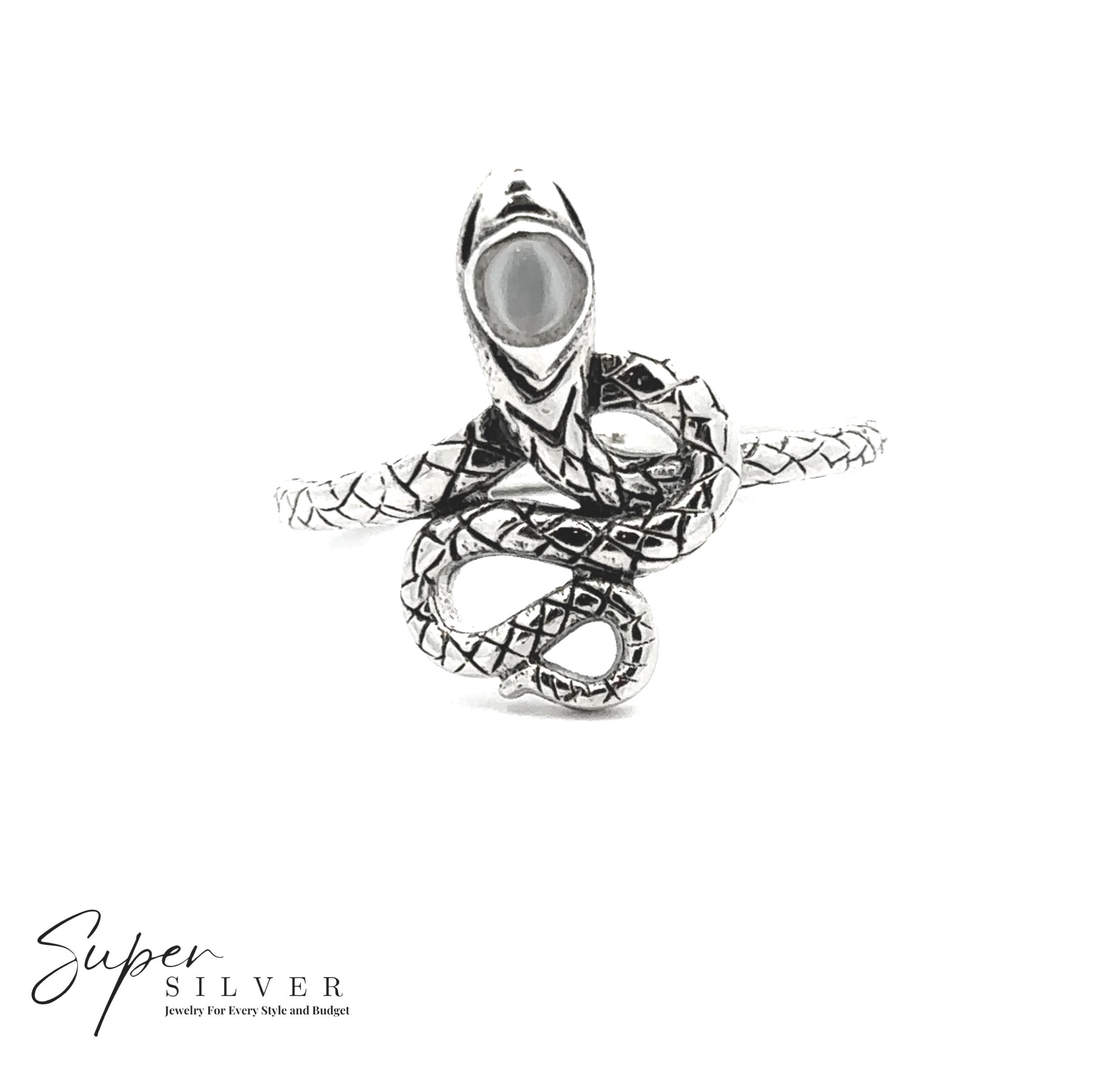 The Coiled Snake Ring with Inlaid Stone features detailed scales in sterling silver, shown coiled on a white background. The "Super Silver" logo is visible in the bottom left corner.