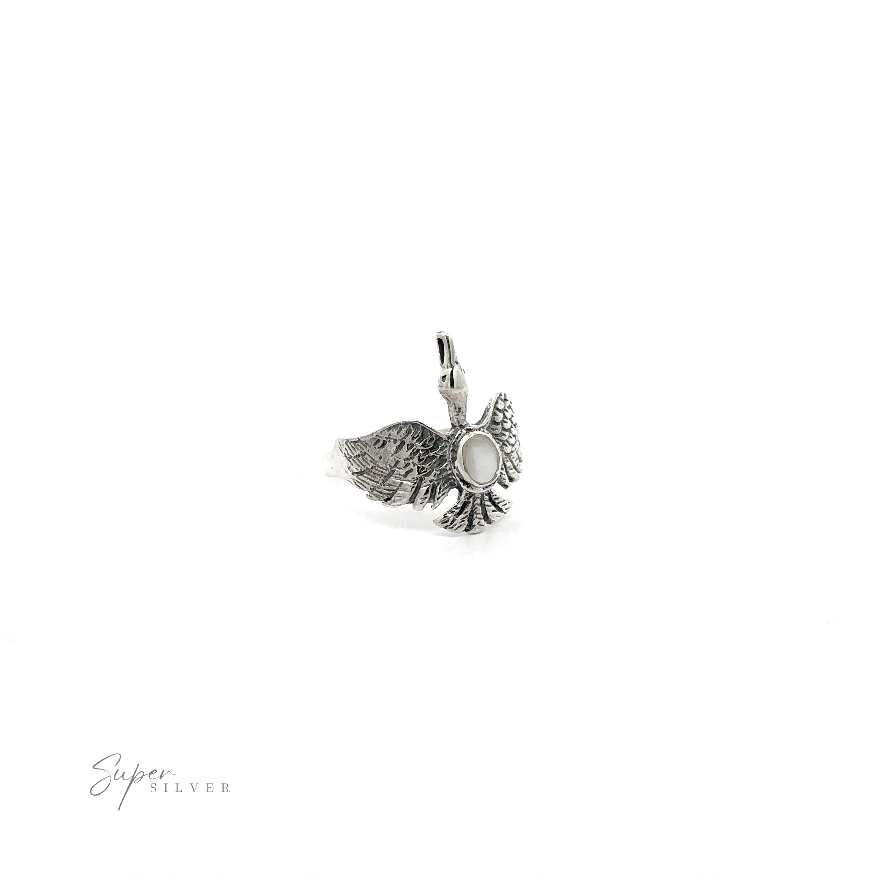 A Swan Ring with Inlay Stone with a bird on it.