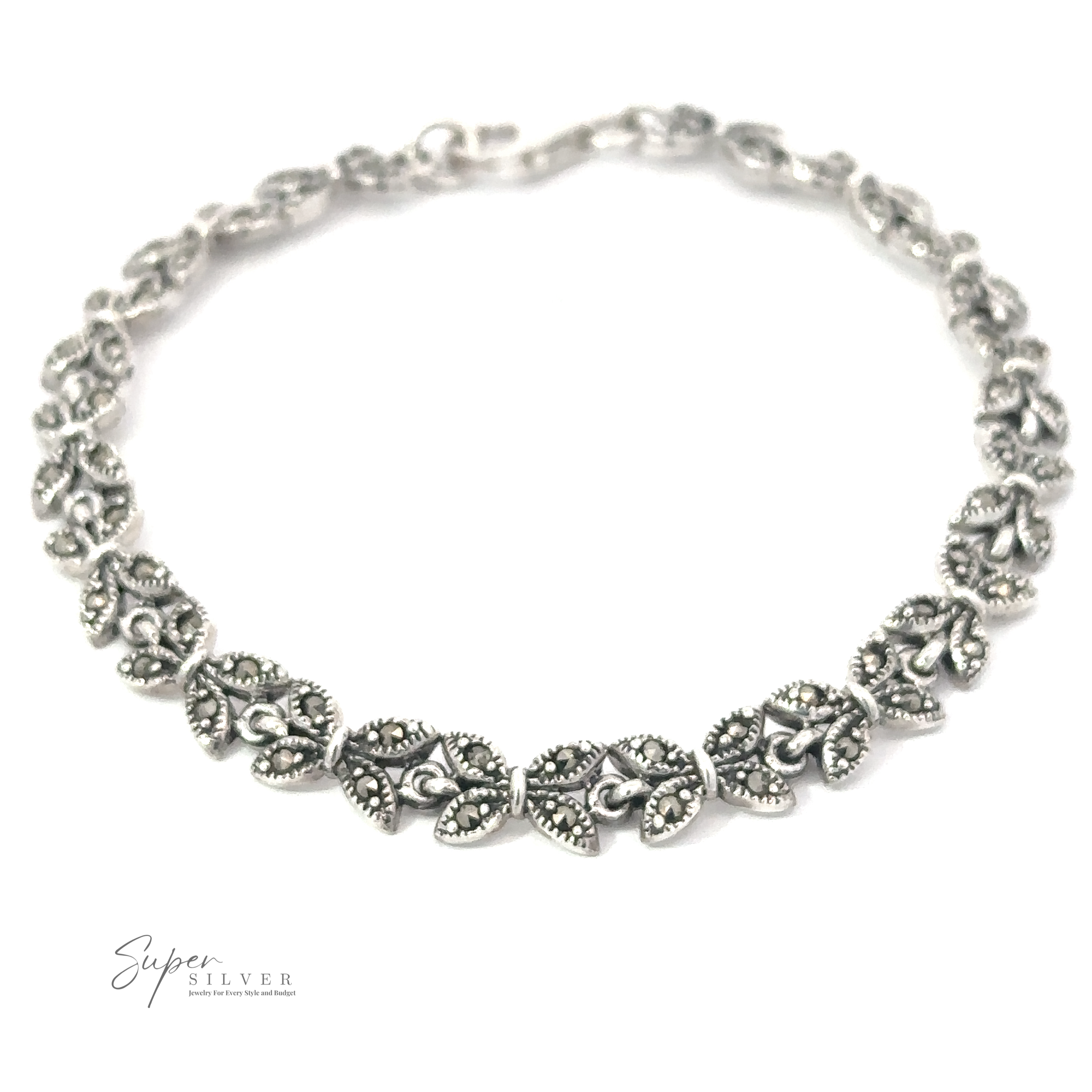 A Marcasite Butterfly Bracelet featuring intricately designed heart-shaped links, each accented with small bead details. Made from .925 sterling silver, the bracelet's clasp is visible, and the image includes a "Super Silver" watermark in the corner.