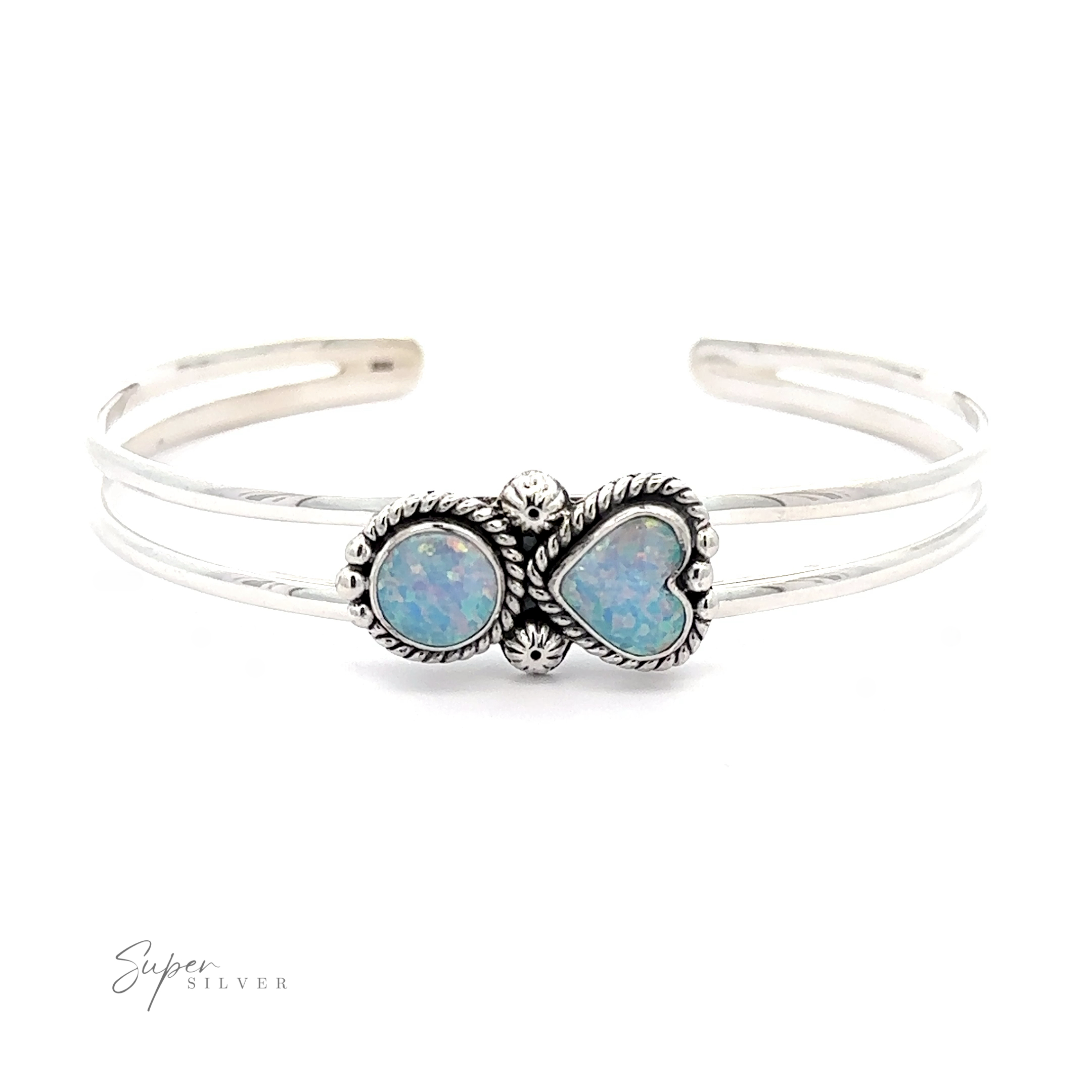 A Opal Heart And Circle Cuff Bracelet featuring two oval opal stones set in intricately designed bezels. The band is split into two parallel sections that merge at the settings, giving it a romantic jewelry appeal. Text reads "Super Silver" in the corner.