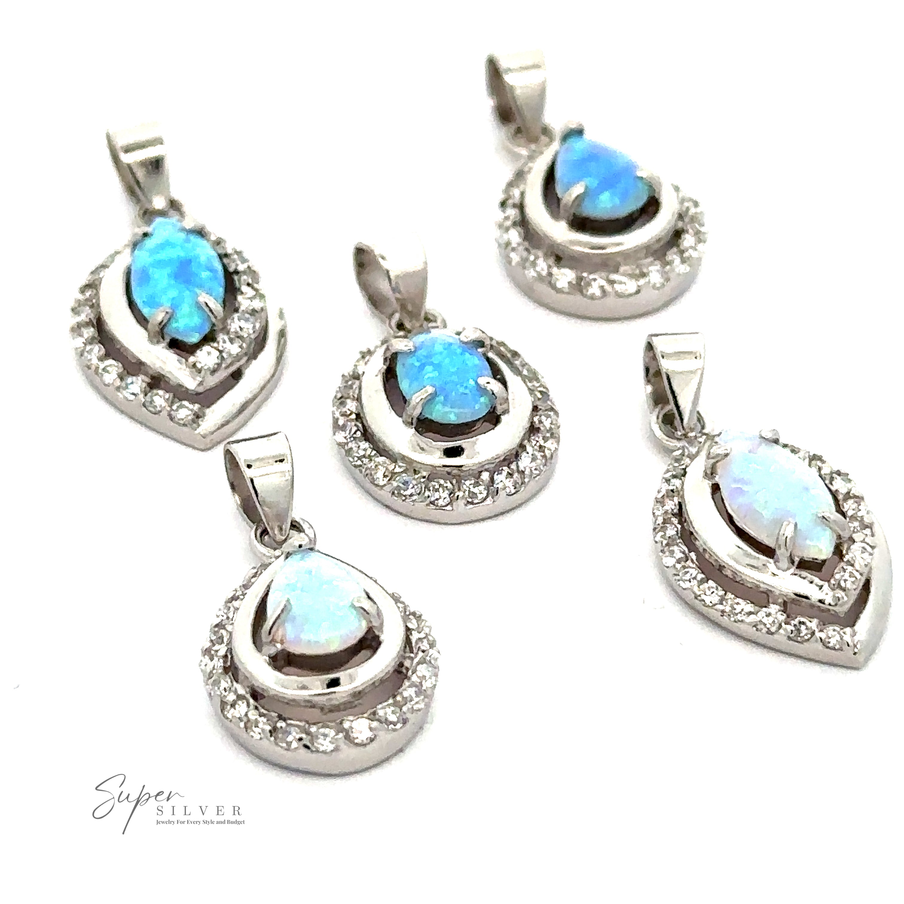 Five Opal Pendants with Cubic Zirconia, arranged on a white background.