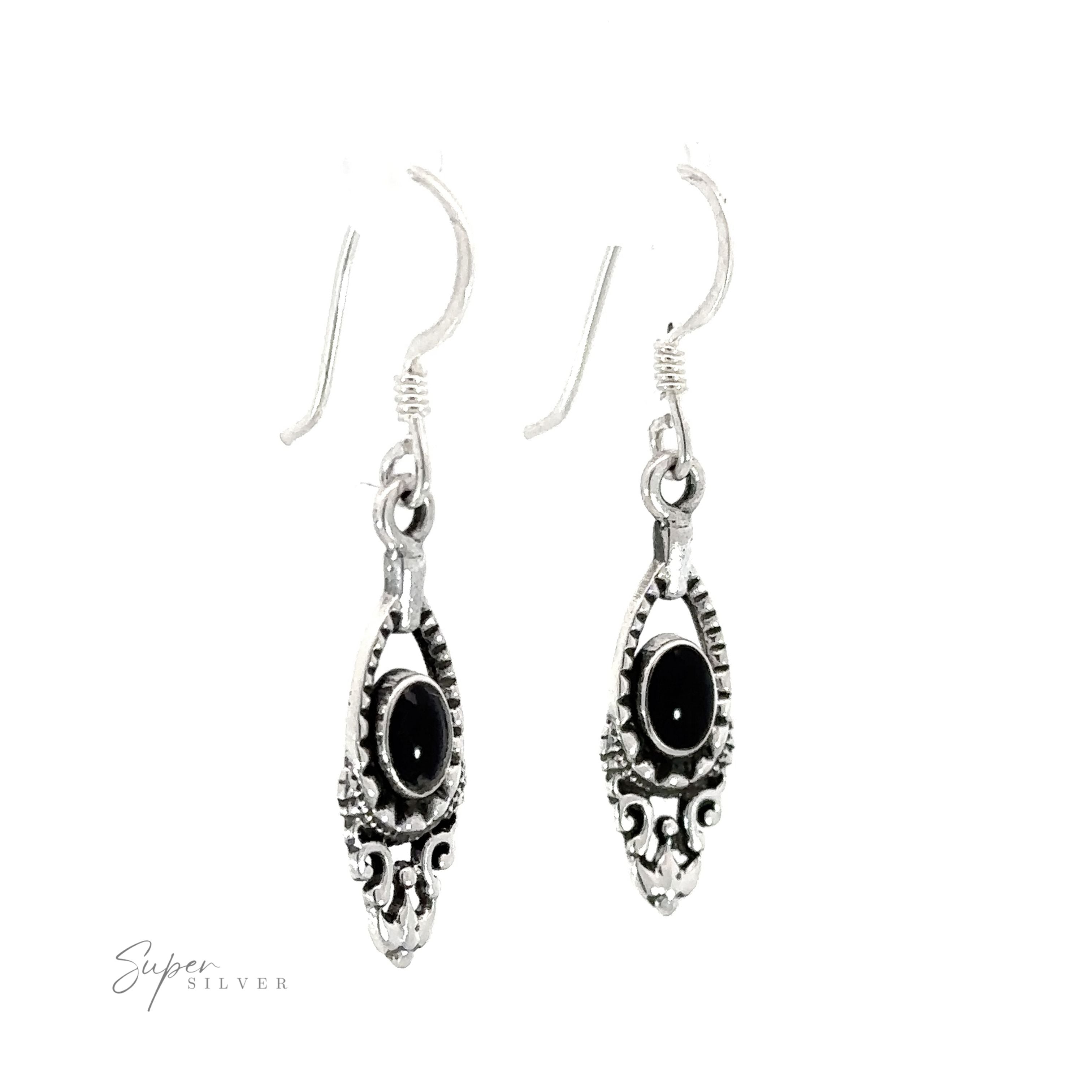 A pair of small Delicate Victorian Stone Earrings on a white background.