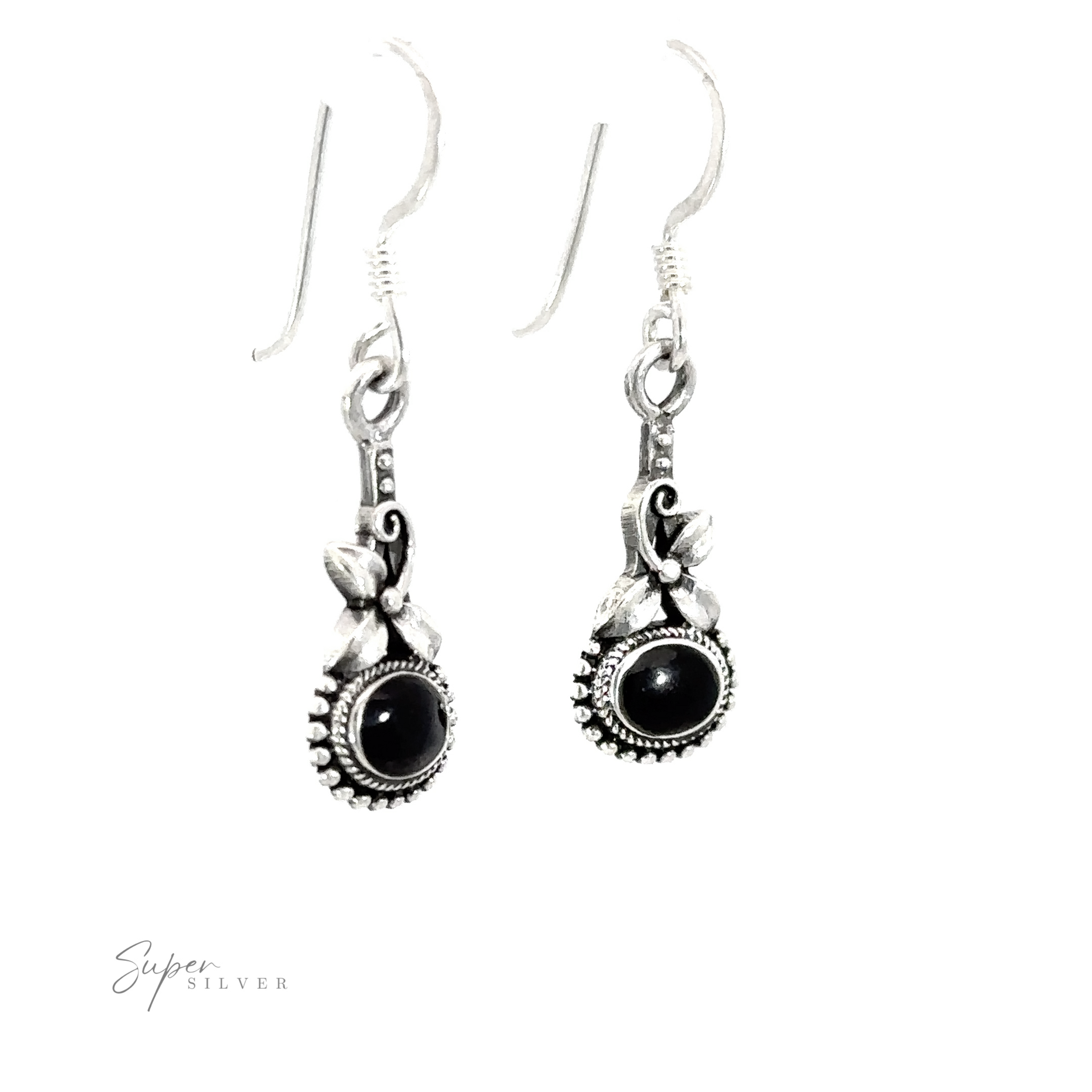 A pair of Inlaid Flower Earrings with Oval Stone featuring boho elegance.