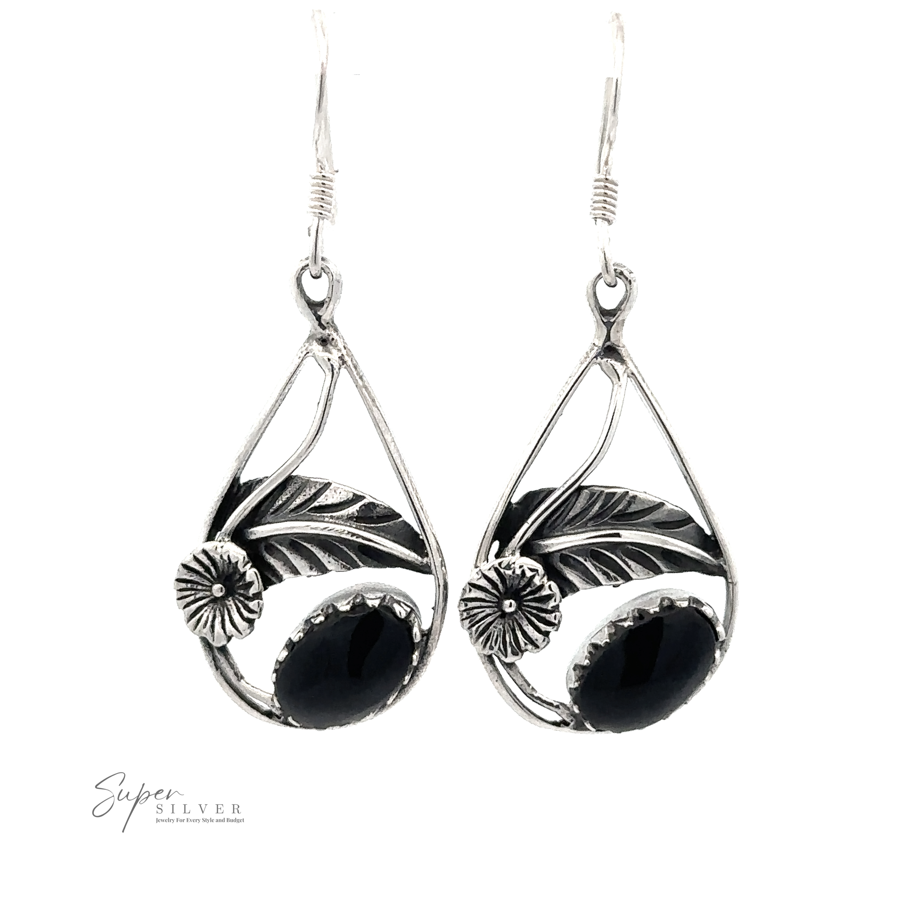 Silver dangle earrings featuring black oval gemstones set within a leaf and floral design, with the logo "Super Silver" in the bottom left corner. These Inlaid Teardrop Earrings With Floral Setting add a touch of elegance to any ensemble.