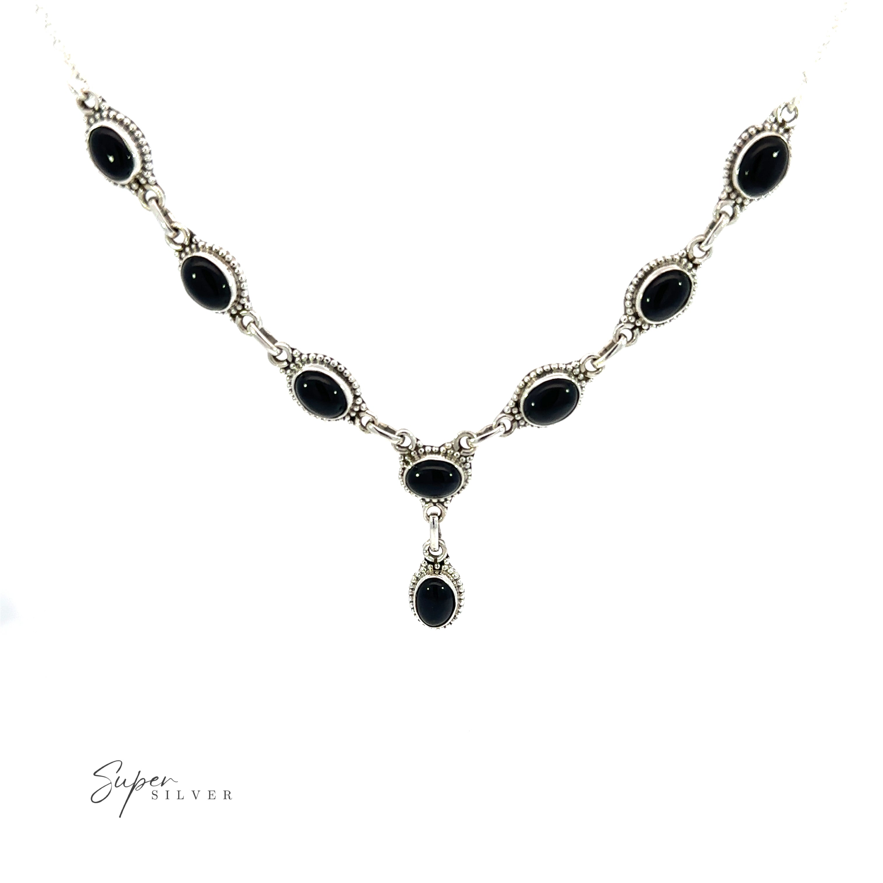 The Gemstone Y-Necklaces with Beaded Border feature a black onyx pendant on a delicate white background. Each gemstone in these necklaces is carefully selected for its vibrant color and natural beauty, ensuring that it