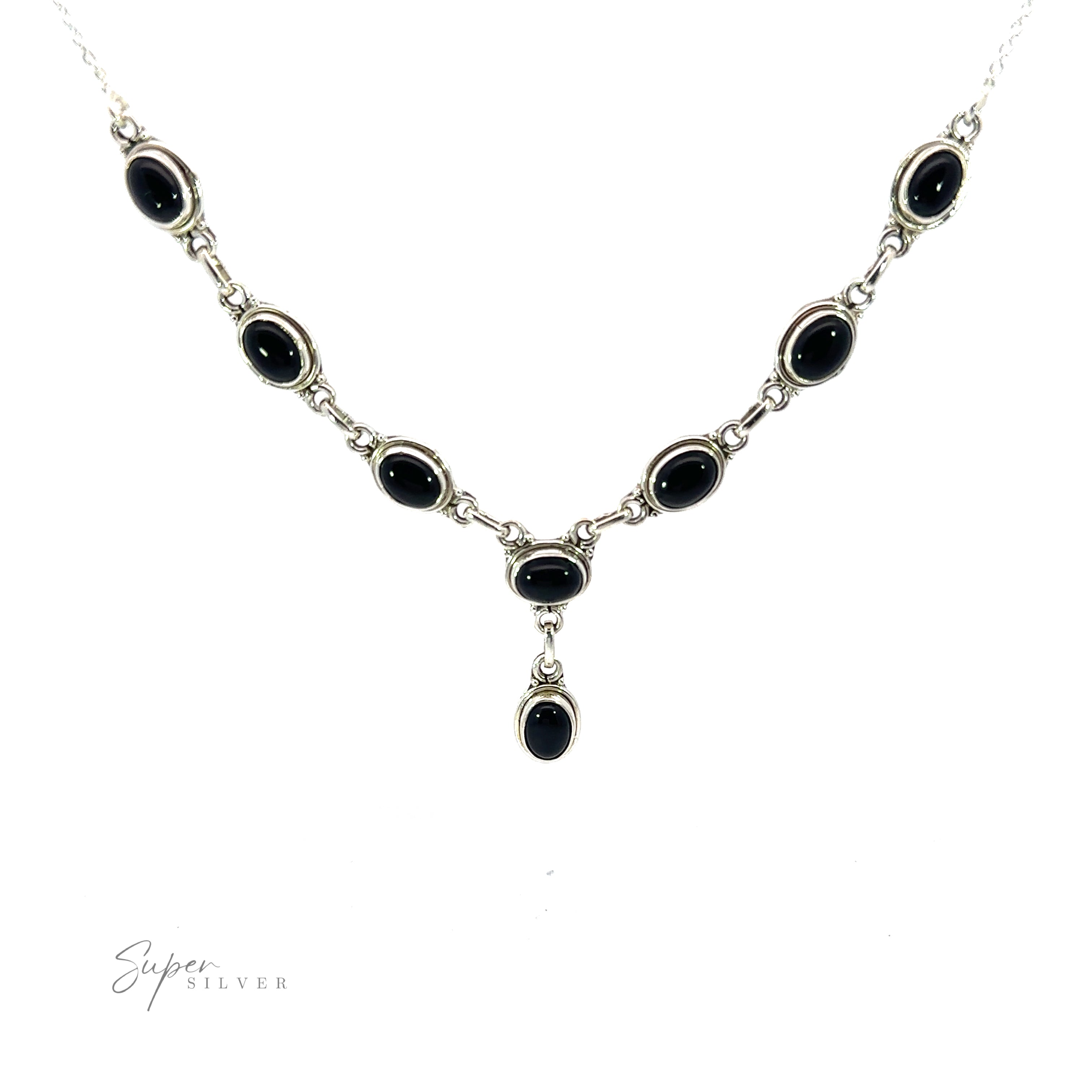 A Simple Oval Y Necklace with Gemstones featuring a series of oval gemstones set in individual links, with one stone hanging from the center. "Super Silver" branding is visible in the bottom left corner.