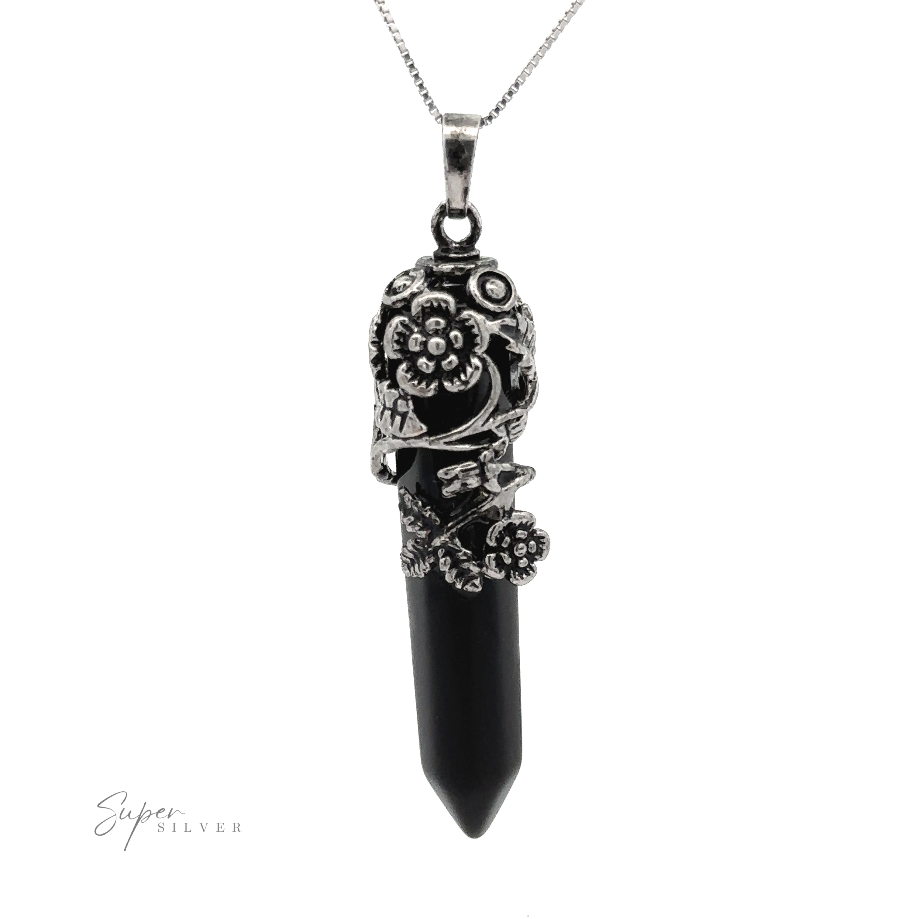 A Silver-Plated Flower Design Stone Pendant delicately cradles a black gemstone in a silver floral setting on a matching chain. The elongated, obelisk-shaped stone tapers to a point at the bottom. "Super Silver" is elegantly inscribed in the lower left corner.