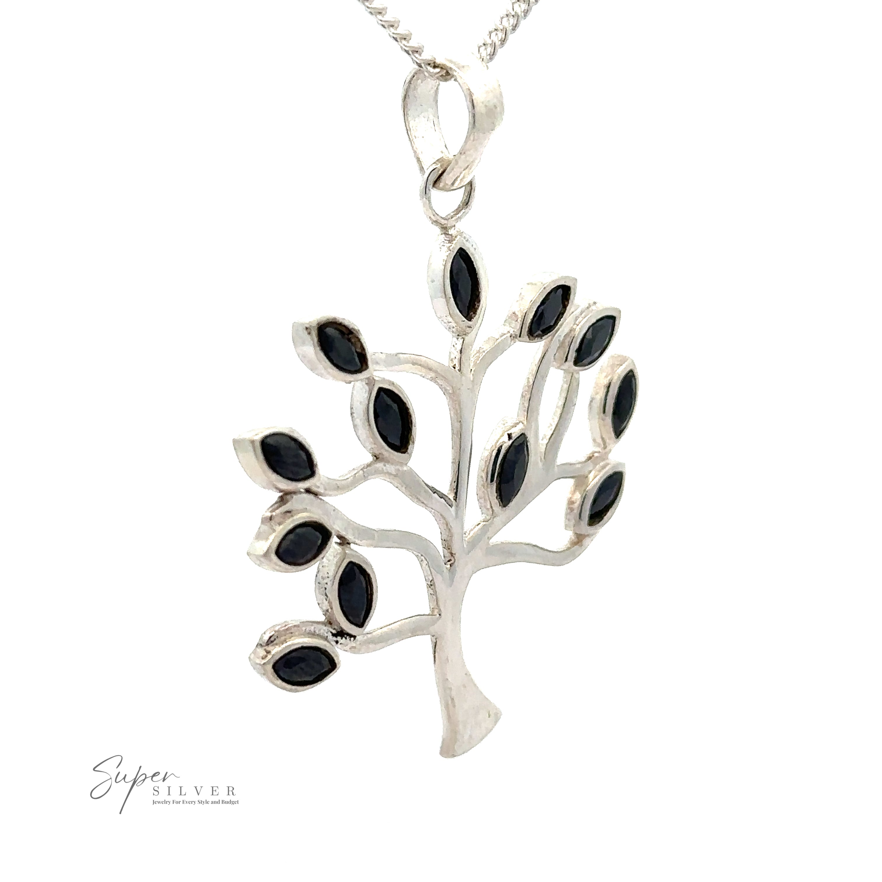 A Tree of Life Pendant with Stone Leaves, measuring 37x50mm, features faceted stone leaves in black, gracefully hanging from a silver chain.