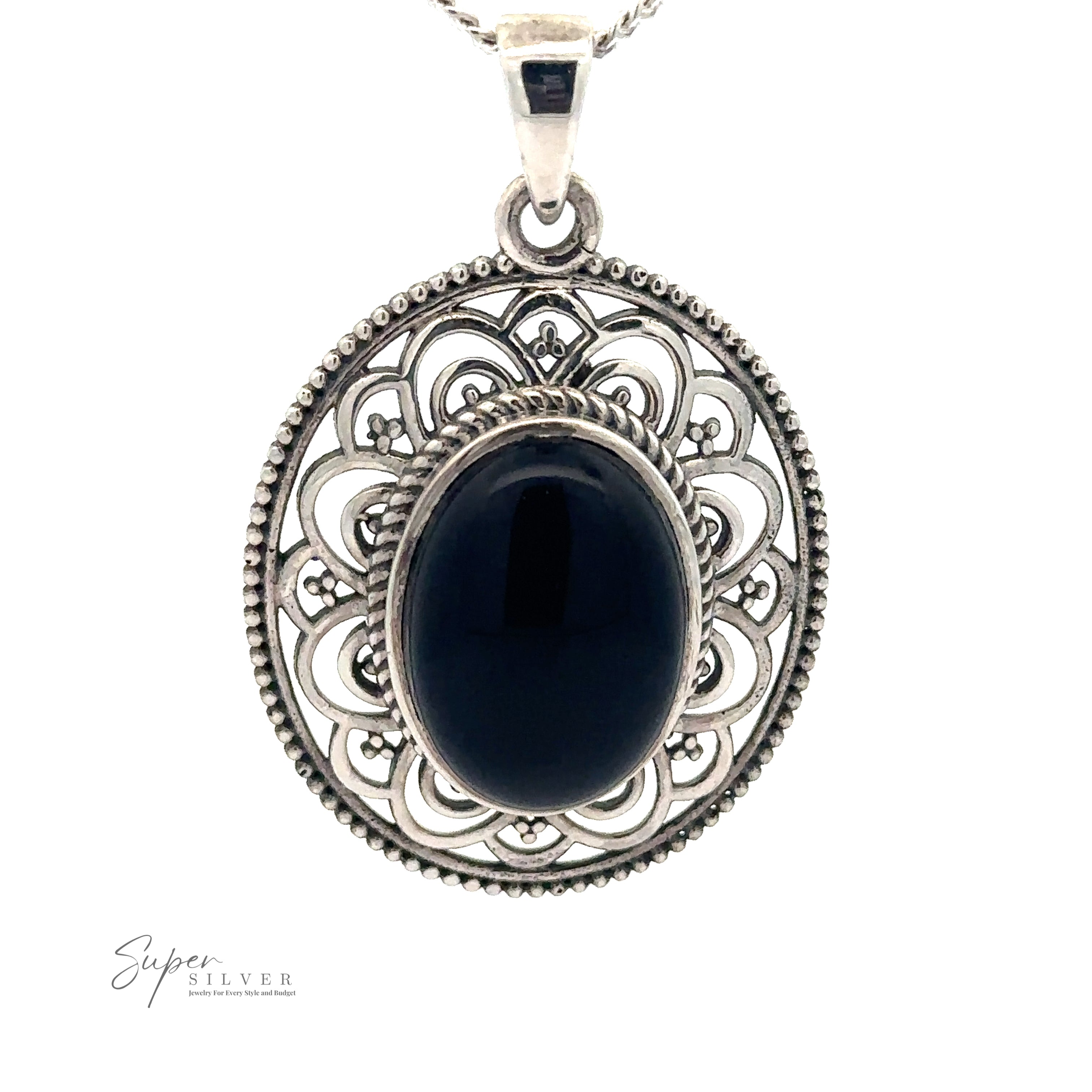 An Oval Stone Pendant with Filigree Border features an ornate filigree design with a large, polished labradorite center, hung on a thin sterling silver chain. The logo "Super Silver" is visible in the bottom left corner.