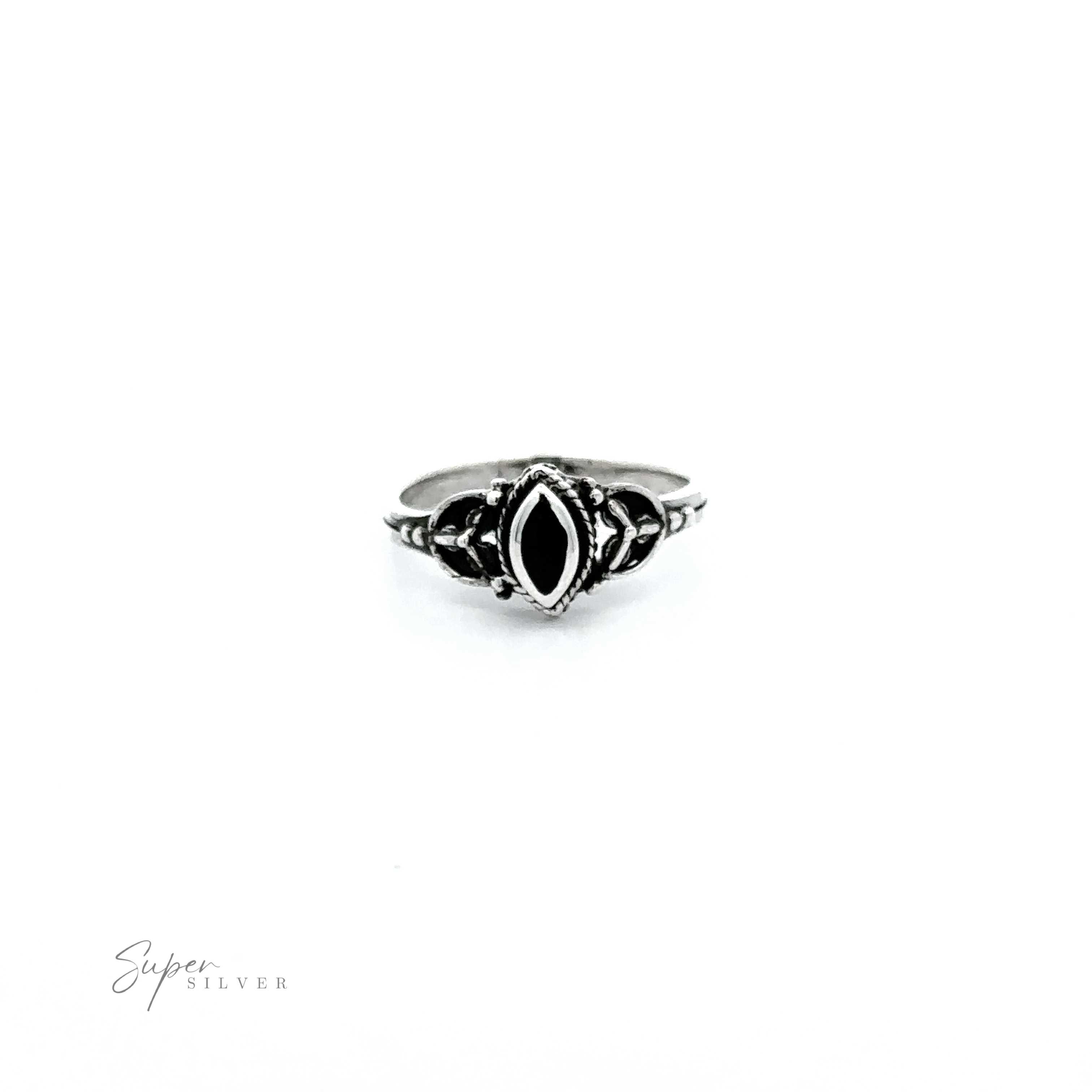 A Tiny Marquise Inlay Stone ring, with a vintage look, on a white background.