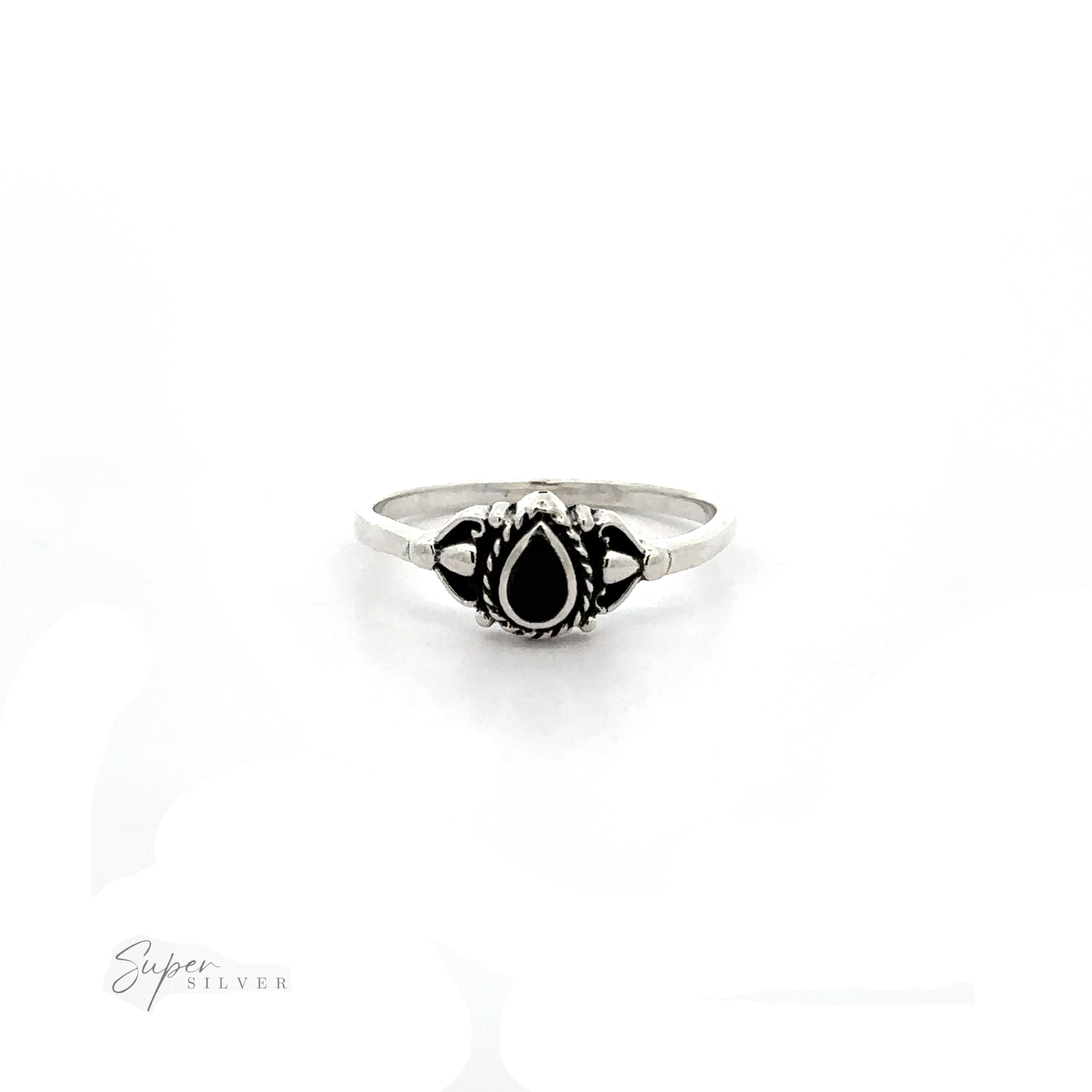A Delicate Teardrop Inlay Stone Ring with Vintage Look with an inlaid black stone.