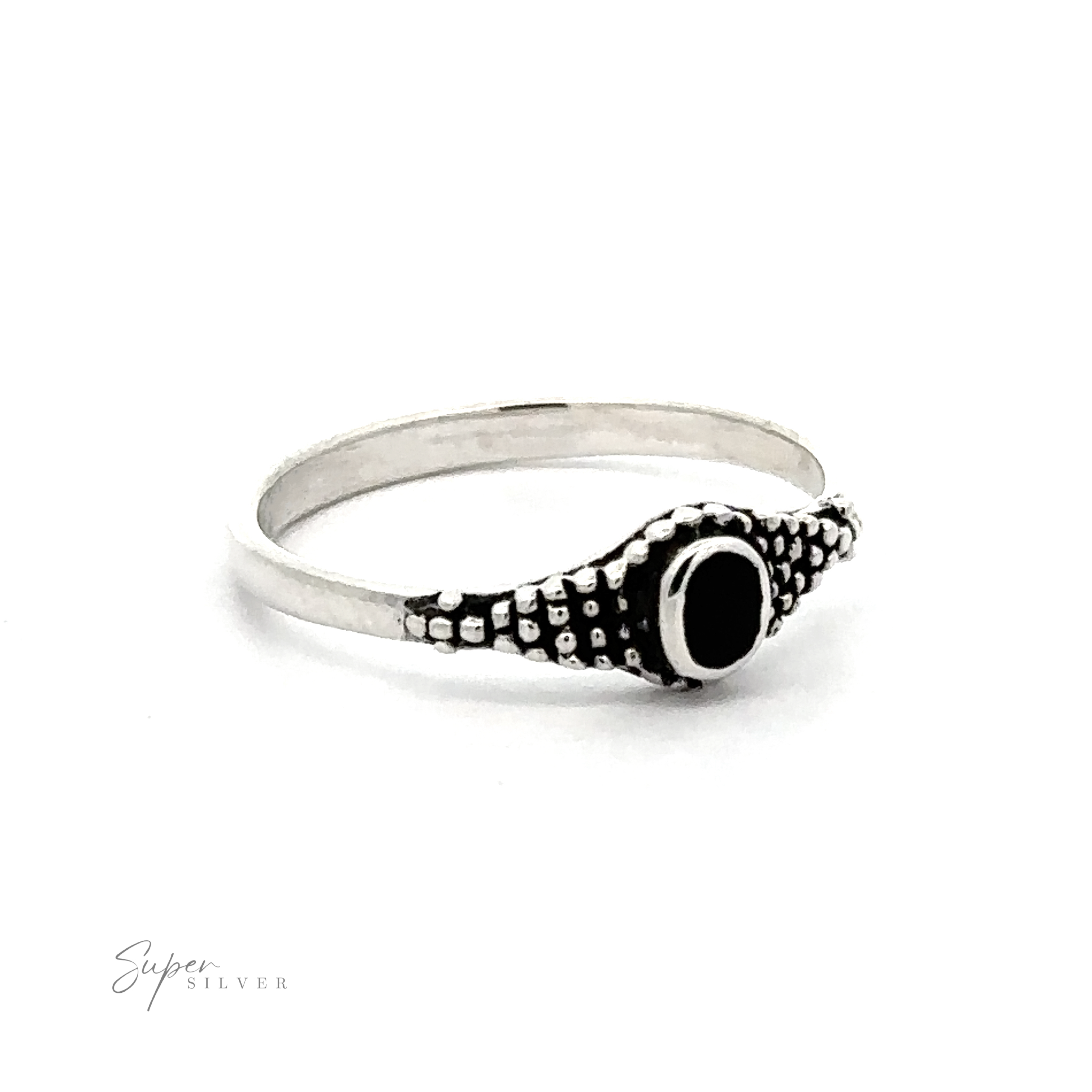 A Dainty Inlaid Ring with Beaded Texture featuring Bali-style beading for a unique touch.