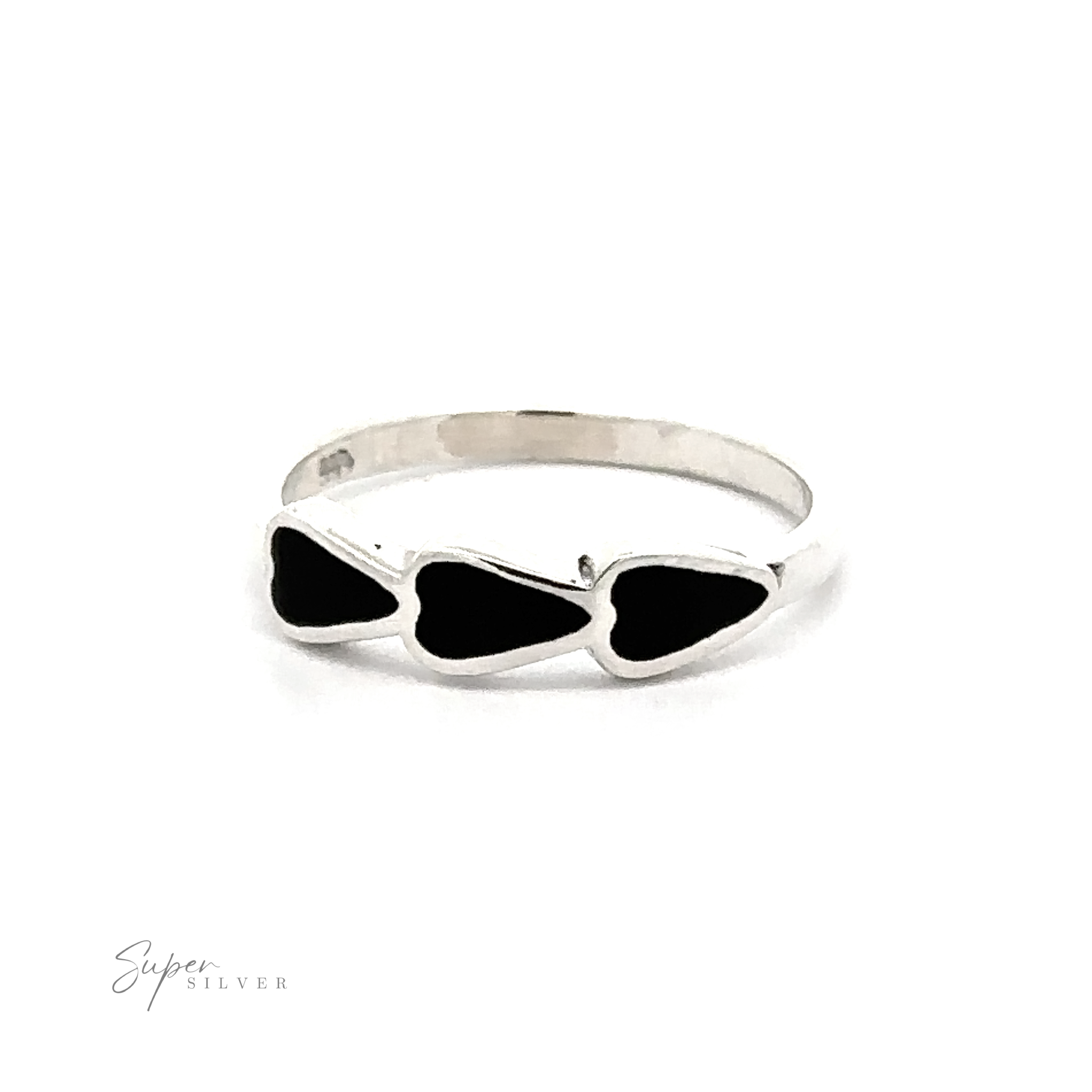 A Triple Heart Ring with Inlaid Stones with three heart-shaped black onyx stones.