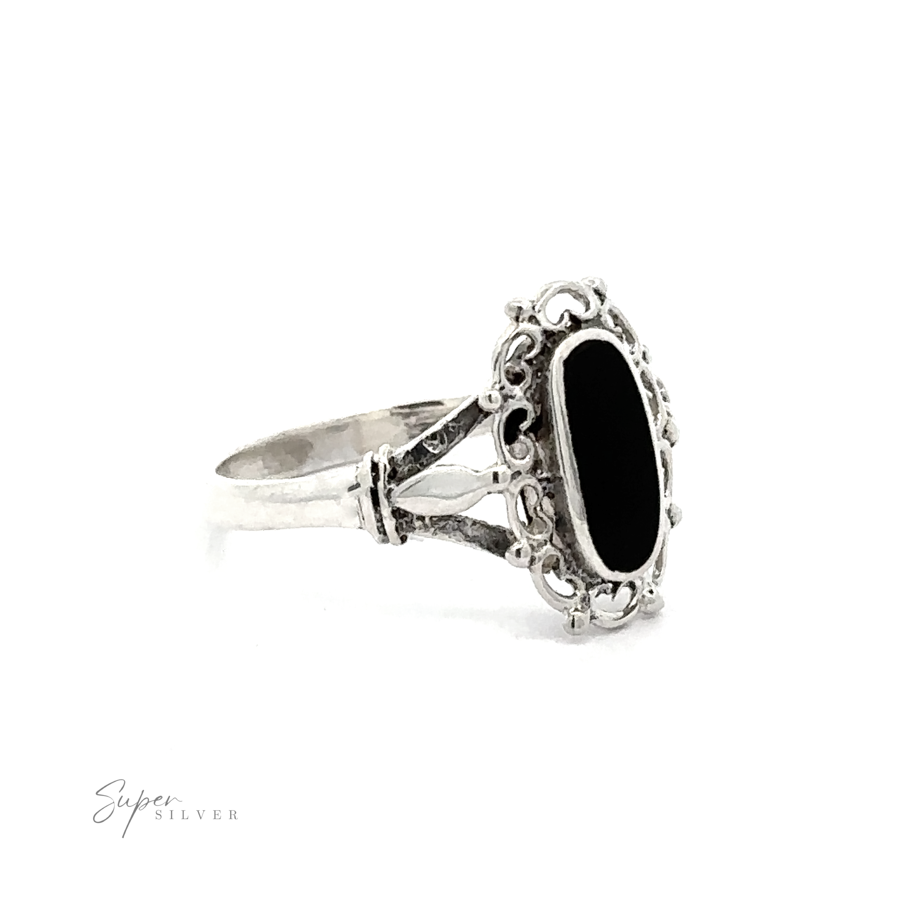 A Inlaid Oval Ring with Filigree Heart Border for a touch of vintage appeal.