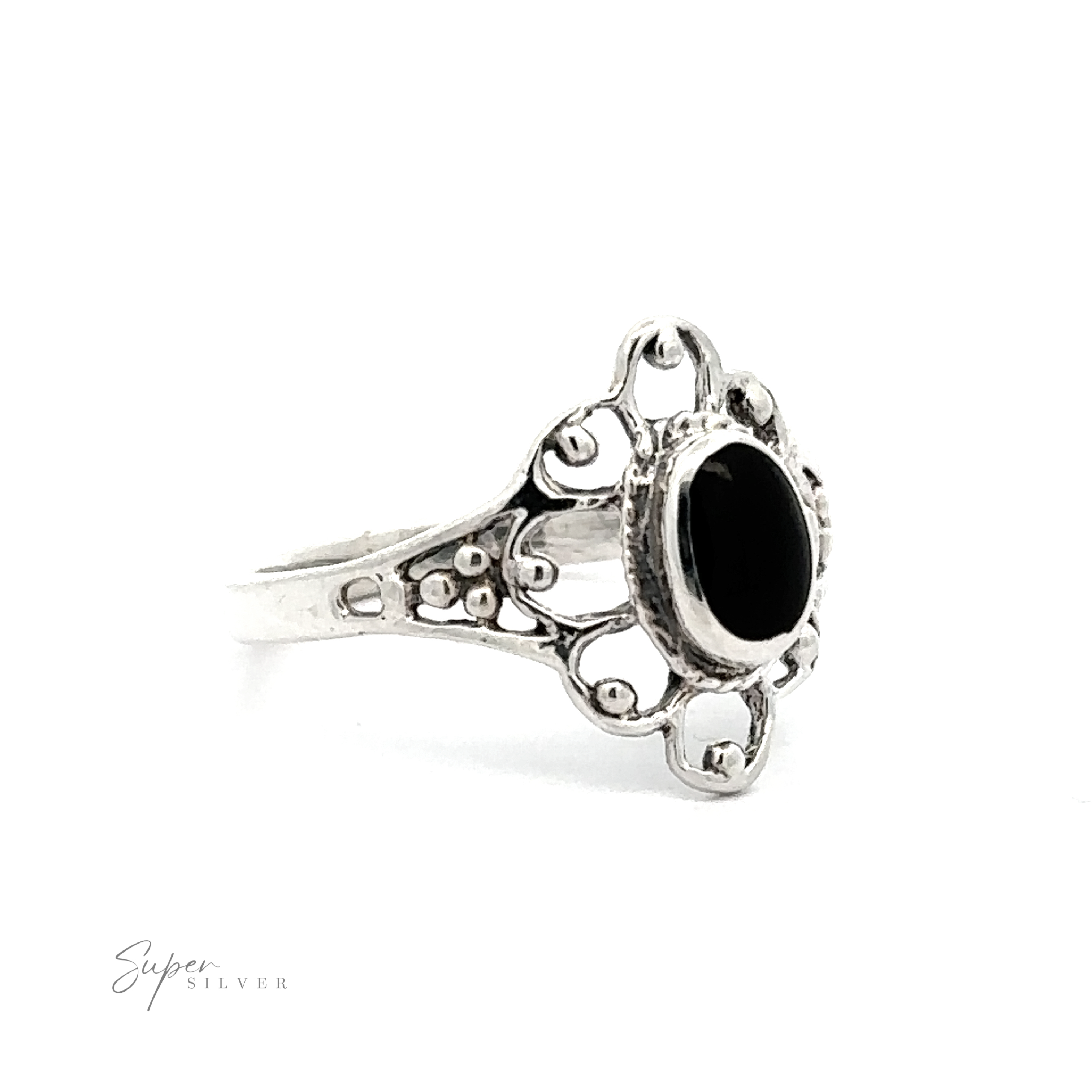 A vintage-styled flower ring with inlaid stones.