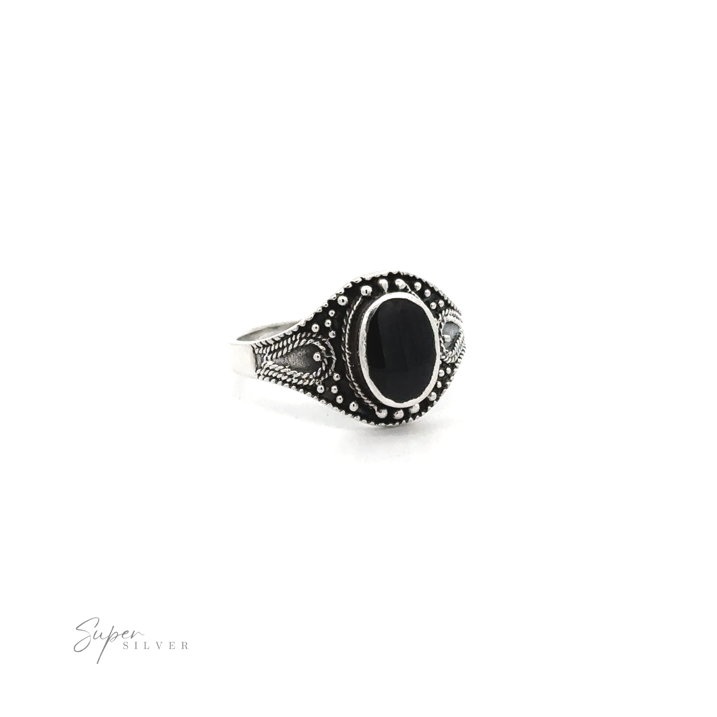 A vintage-chic Vintage Style Oval Shield Ring with Inlaid Stones, featuring oxidized detailing to spruce it up.