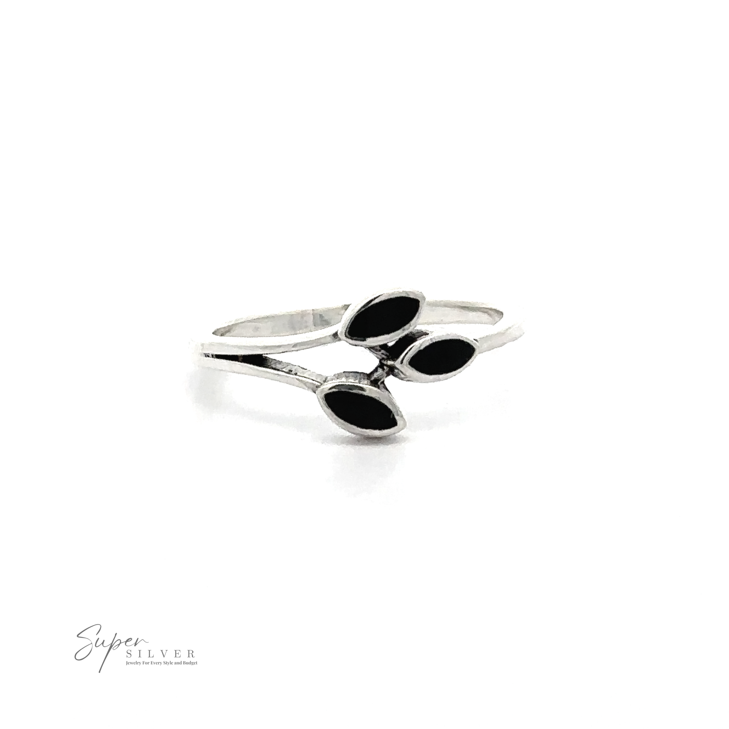 Discover the elegance of our Tiny Leaves Ring with Inlaid Stones, featuring three black oval stones arranged in a triangular pattern on a plain white background. With its minimalist design, this piece embodies sophistication and subtlety. A small "Super Silver" logo graces the bottom left corner.