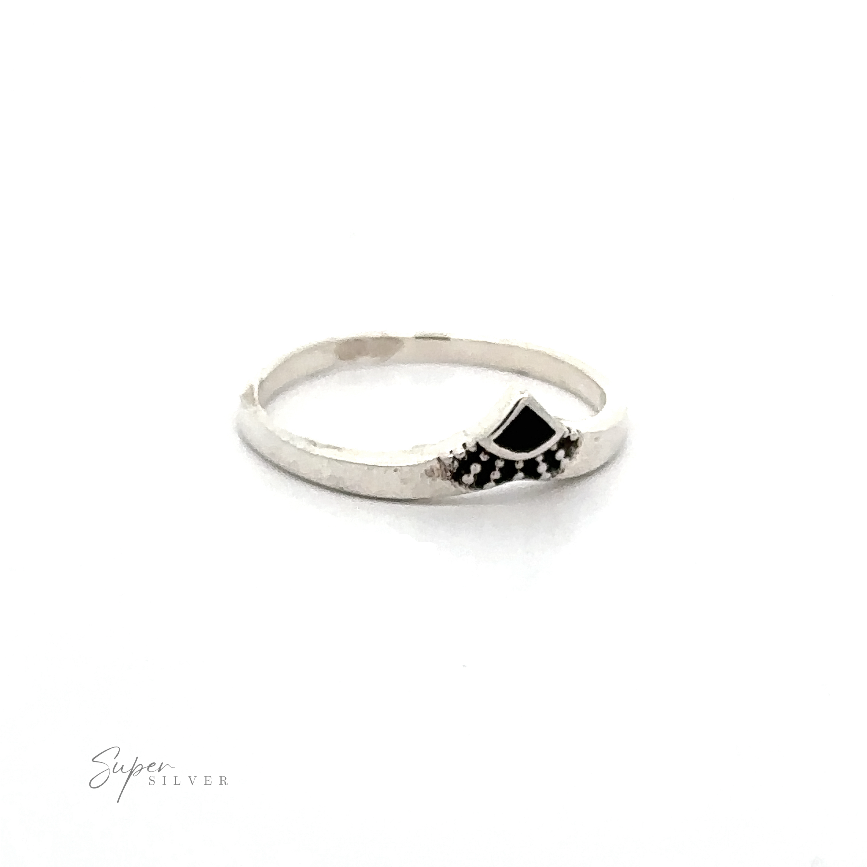A Dainty Chevron Bali Style Inlay Ring adorned with black and white stones.