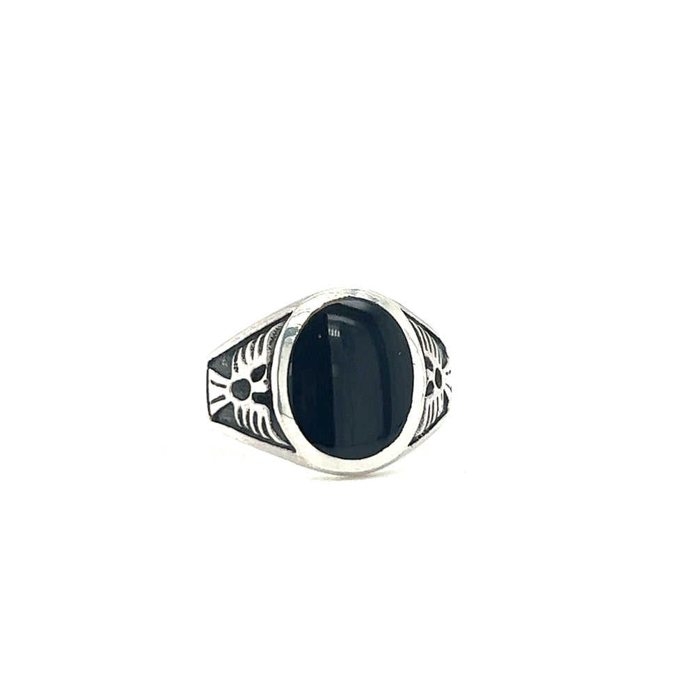 A sterling silver Oval Onyx Ring With Thunderbird Design, inspired by Native American culture.