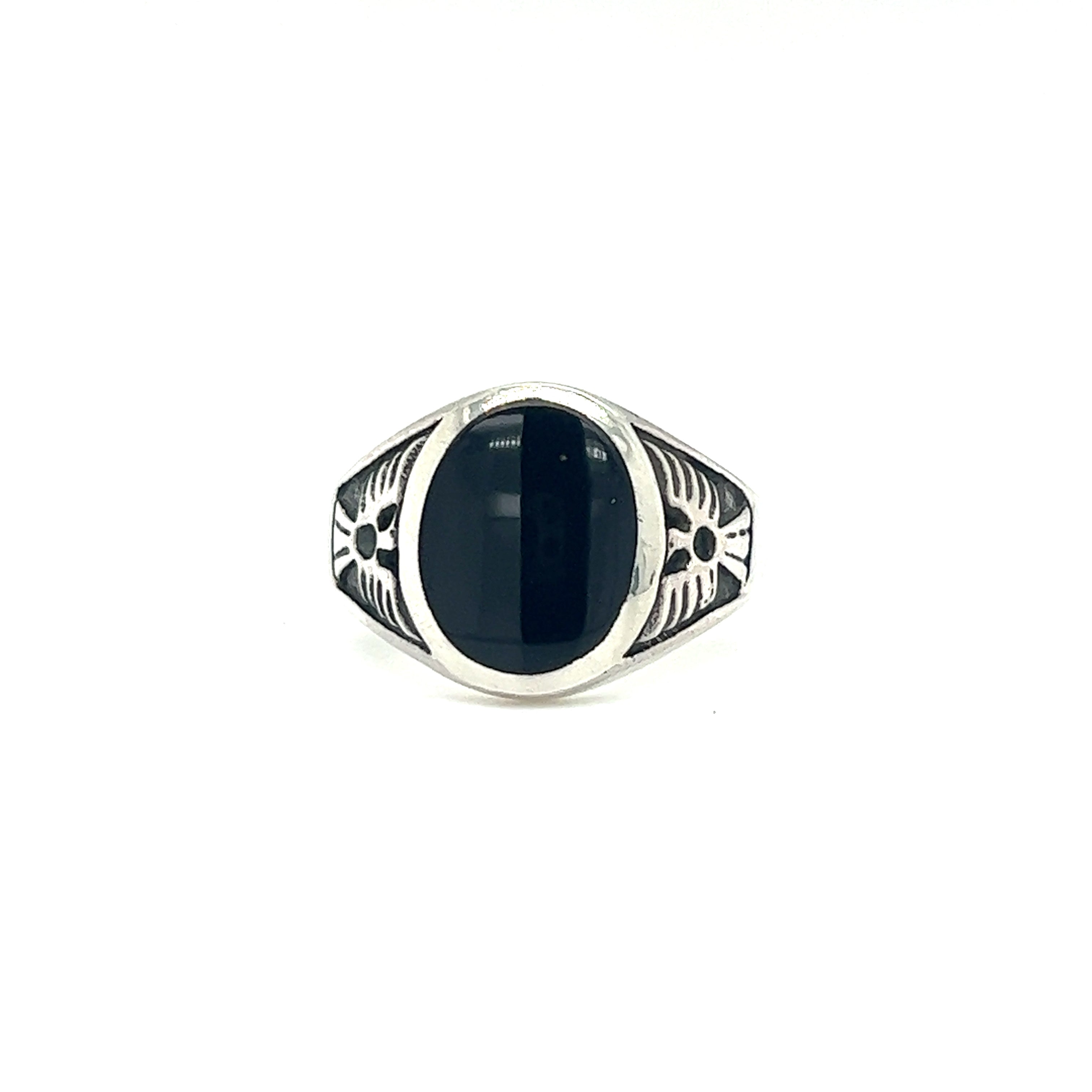 A sterling silver Oval Onyx Ring With Thunderbird Design.