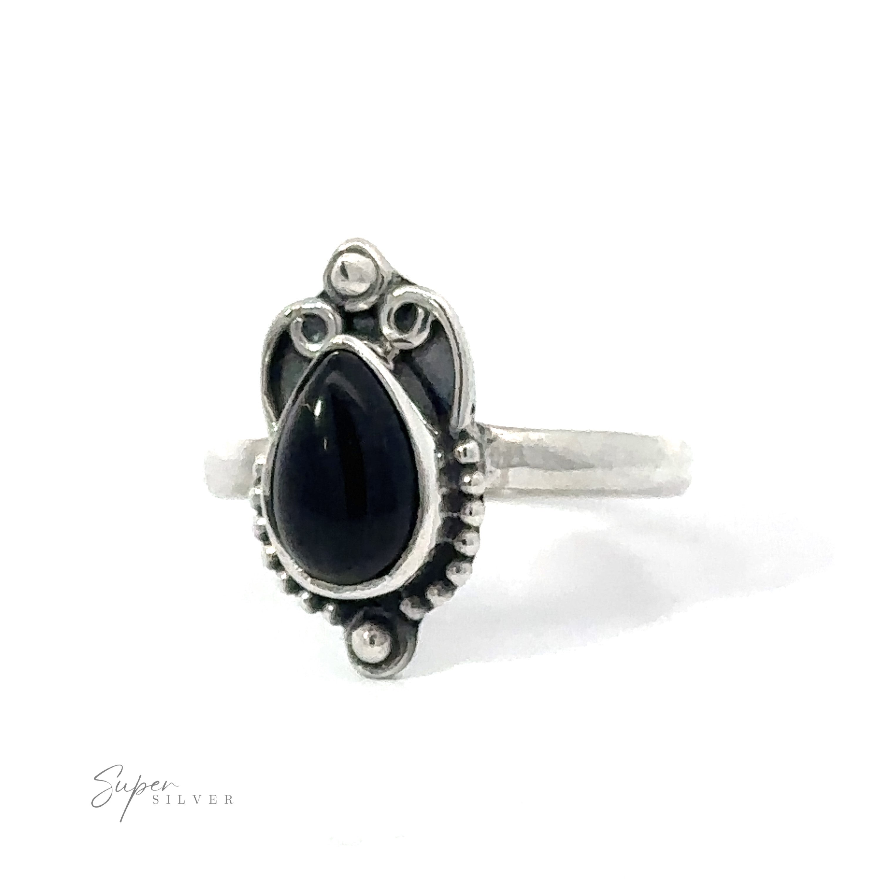 Vintage Inspired Teardrop Gemstone Ring with a black teardrop gemstone, embellished with intricate metal details, displayed against a white background.