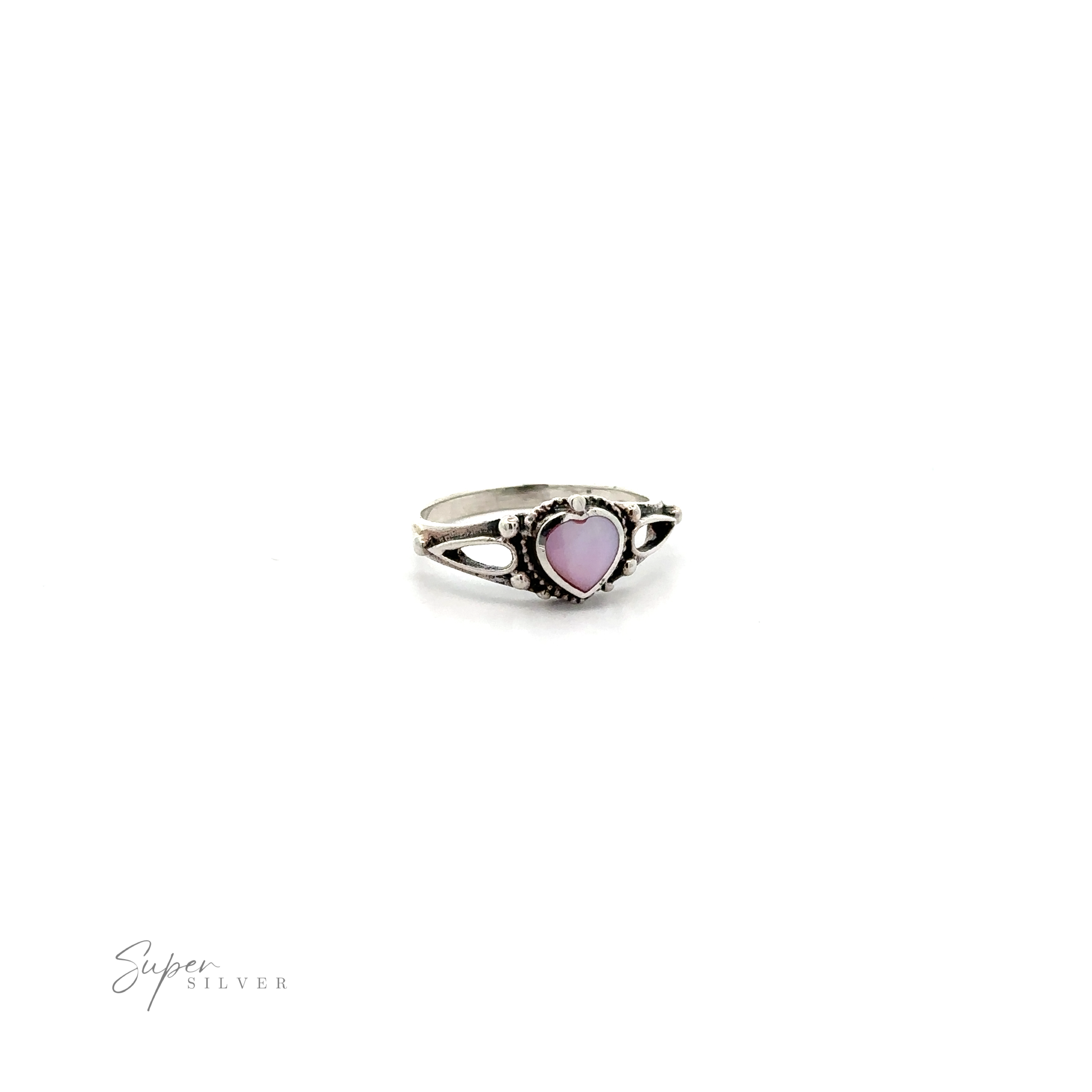 Vintage charm silver Inlaid Stone Heart Ring set in an ornate band, isolated on a white background.