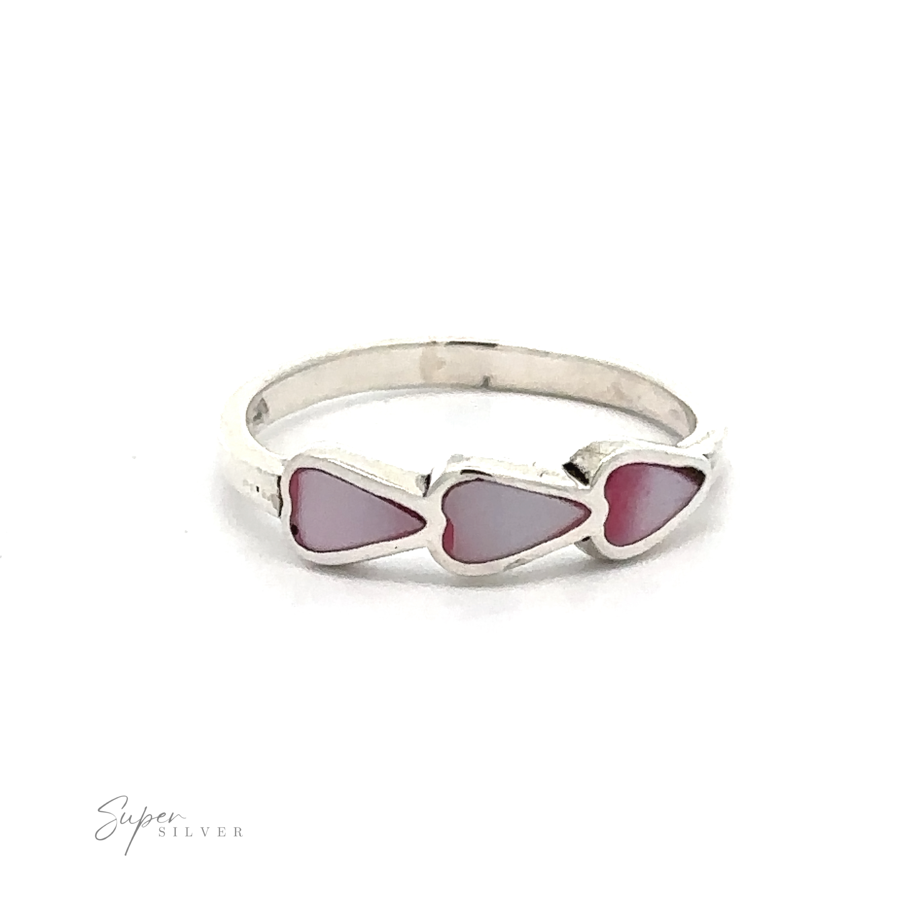 A Triple Heart Ring with Inlaid Stones in sterling silver with three heart-shaped pink stones.