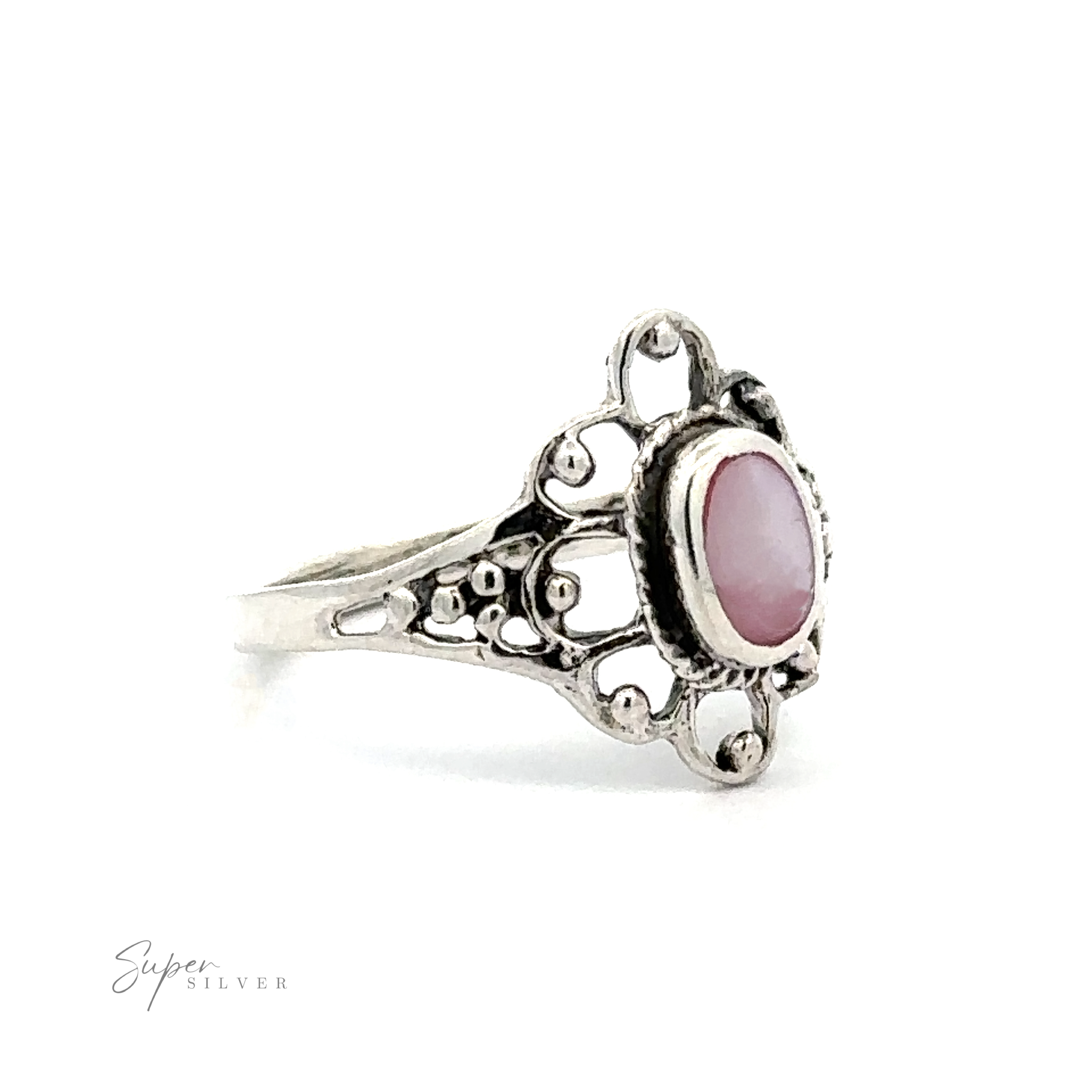 A Vintage-Styled Flower Ring with Inlaid Stones with inlaid stones and lacey petals.