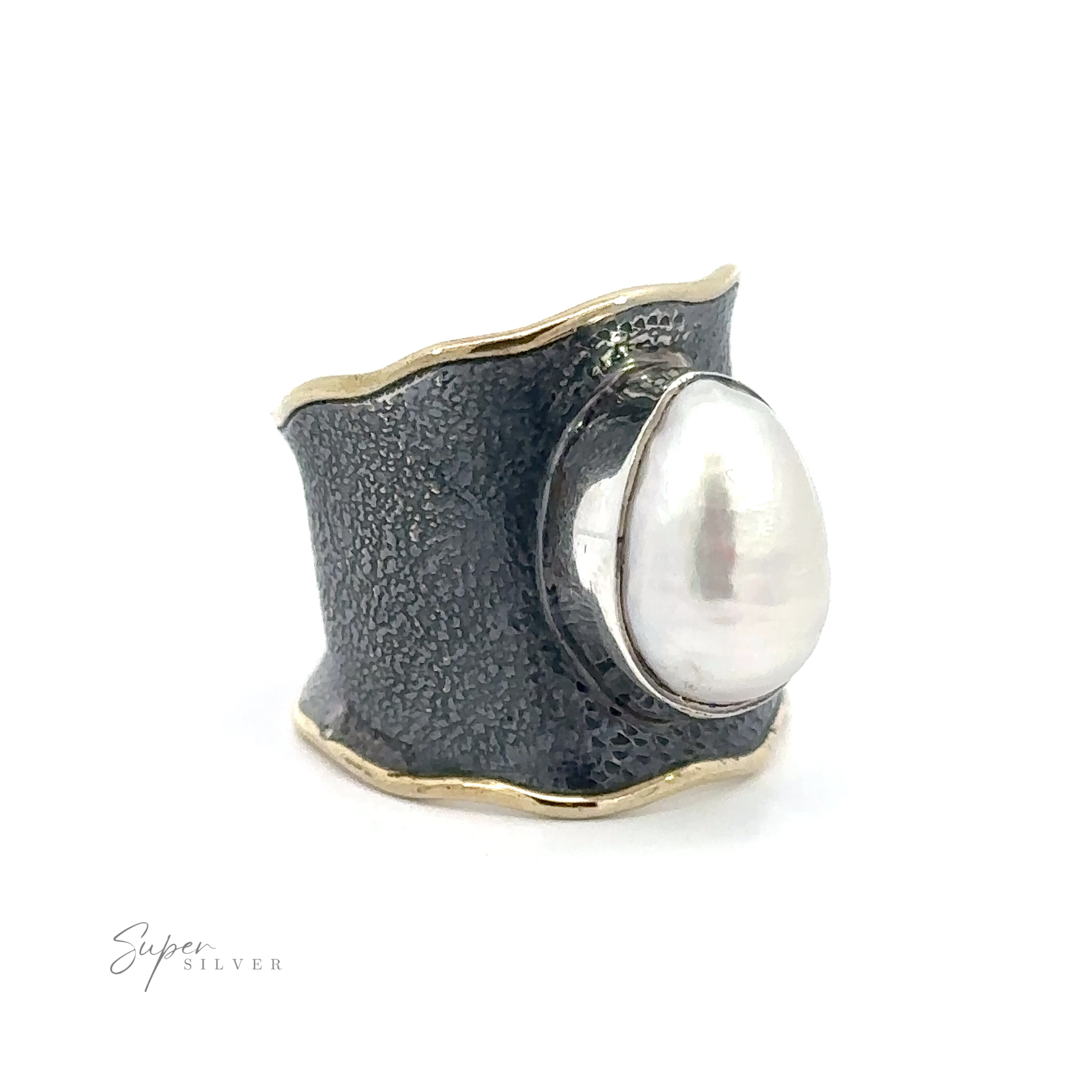 A textured oxidized cigar band with gold trim and pearl centerpiece.