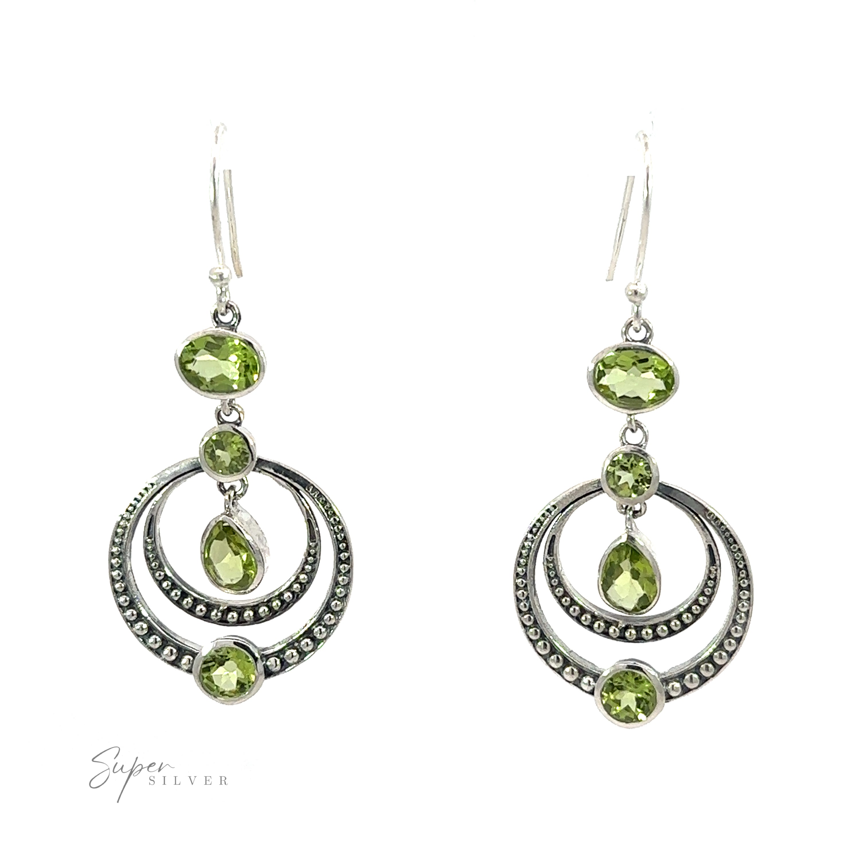 A pair of Overlapping Circle Earrings with Vibrant Gemstones. The double circle Bali-style earrings feature a detailed beadwork design around the stones.