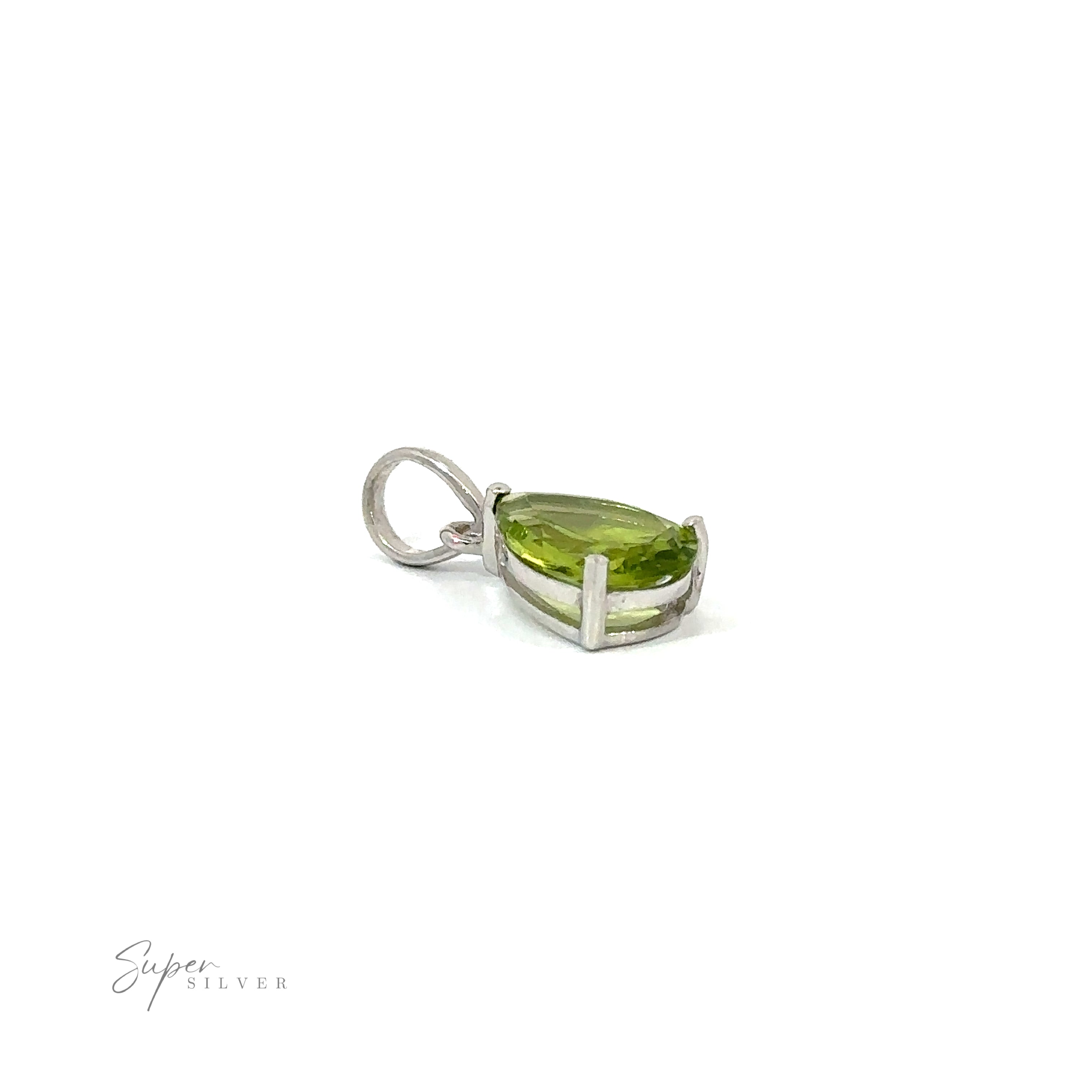 Dainty faceted peridot pendant in sterling silver with a minimalist style.