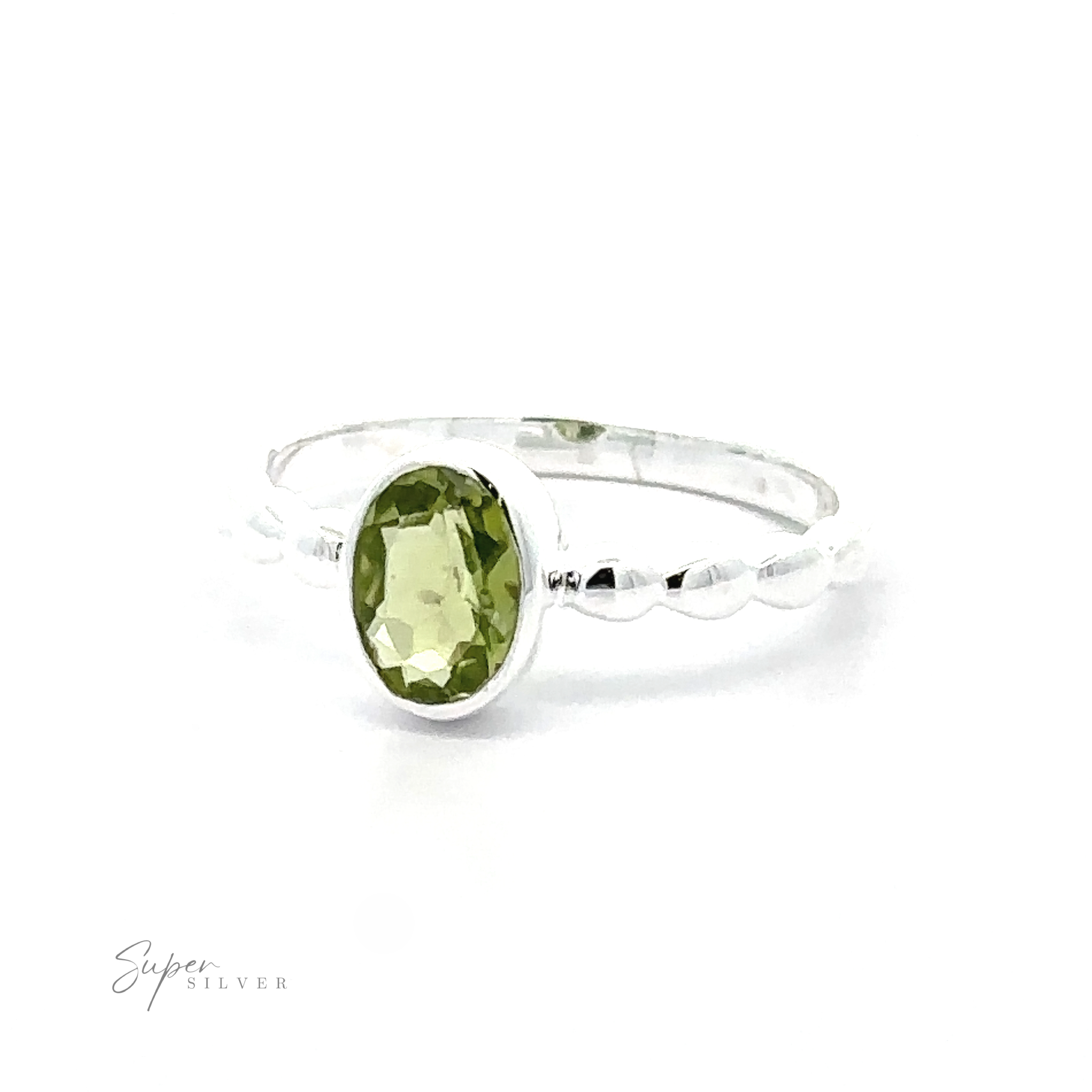 A silver Oval Gemstone Ring with Beaded Band featuring a green oval gemstone set in a simple, twisted band, against a white background.