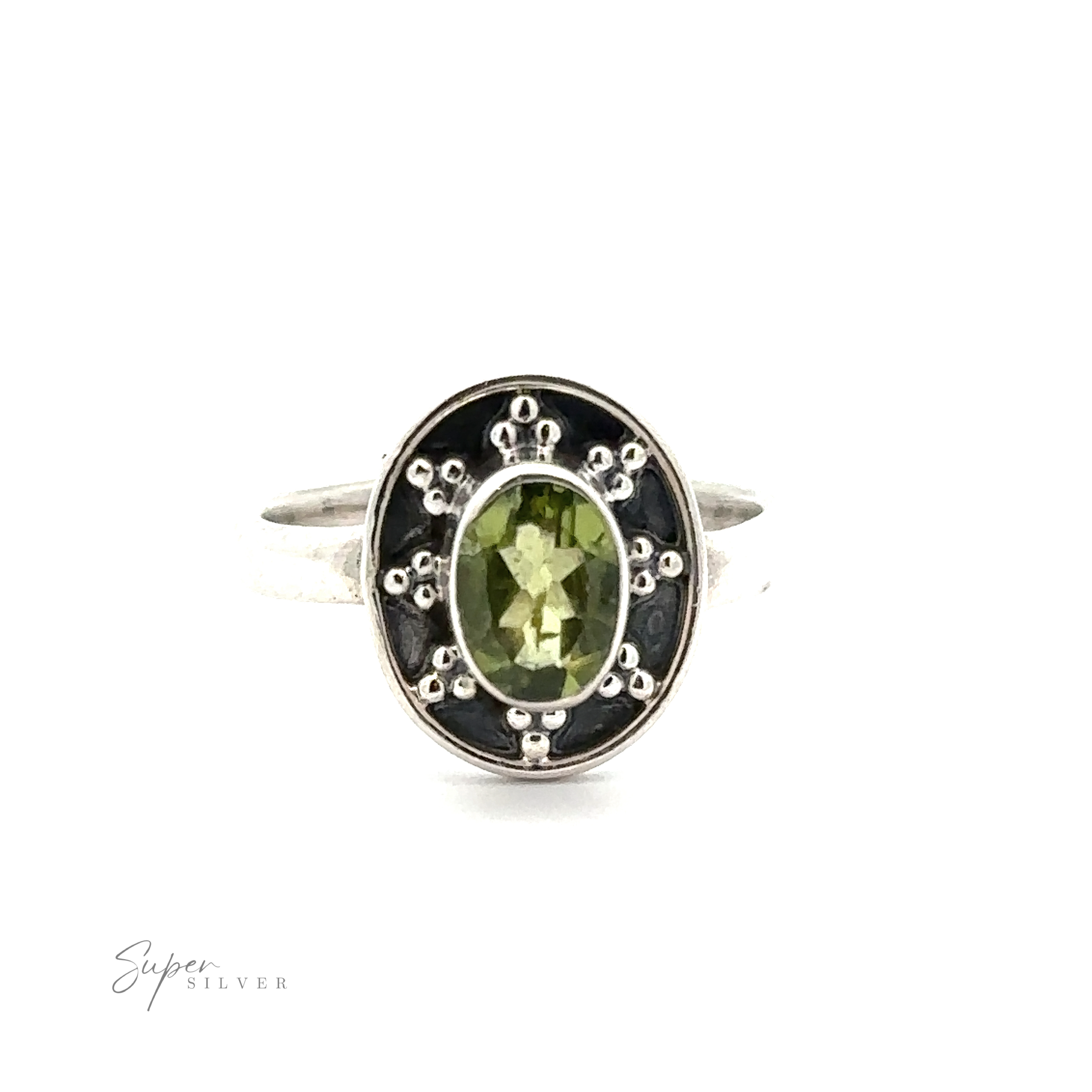 An Oval Gemstone Ring with Ball and Disk Border, with a central green gemstone surrounded by decorative metal details, exudes a vintage-inspired elegance. The brand name "Super Silver" is visible in the lower left corner.