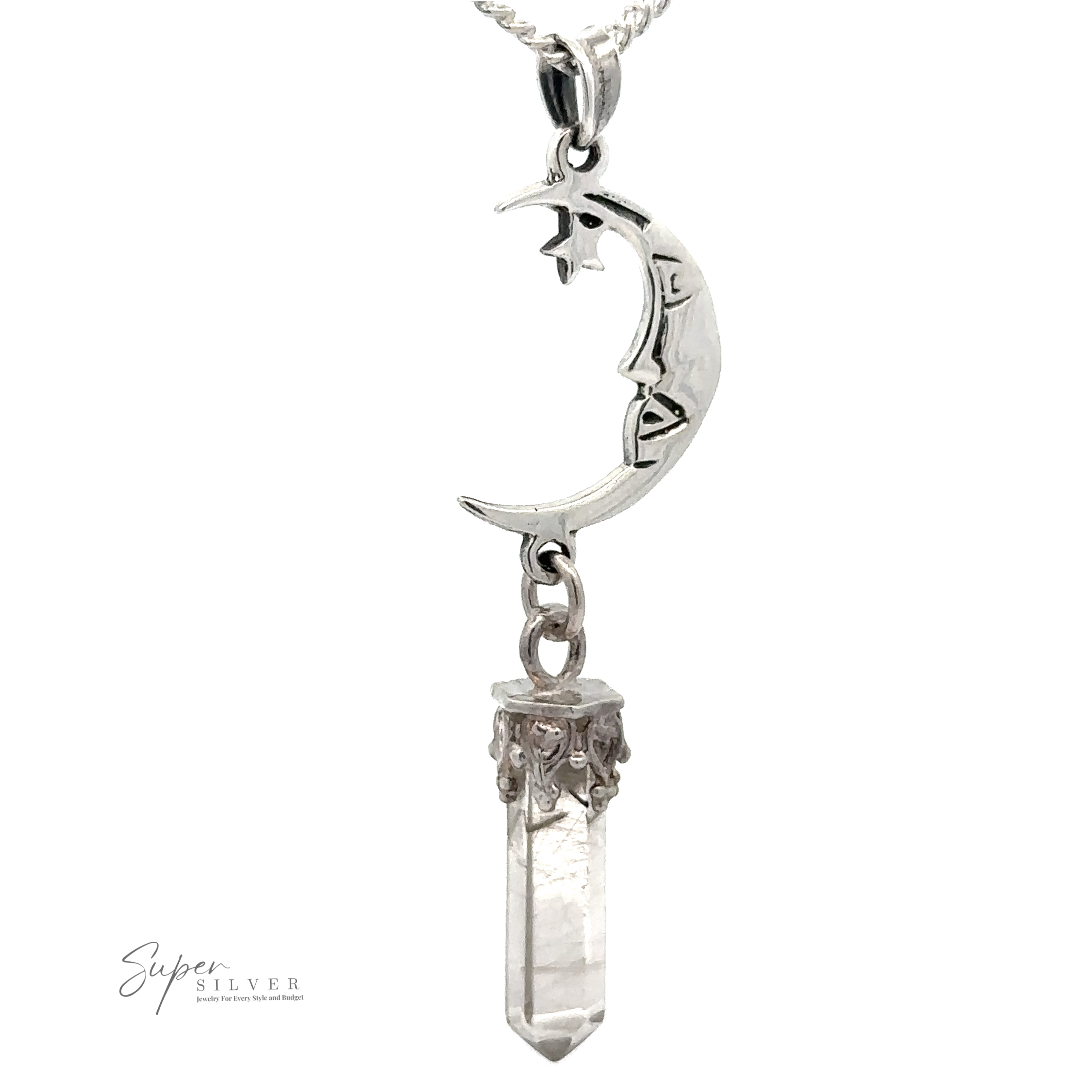 The Crescent Moon With Crystal Pendant features a sterling silver crescent moon with a face detail, holding a clear quartz crystal point and elegantly hanging from a silver chain.