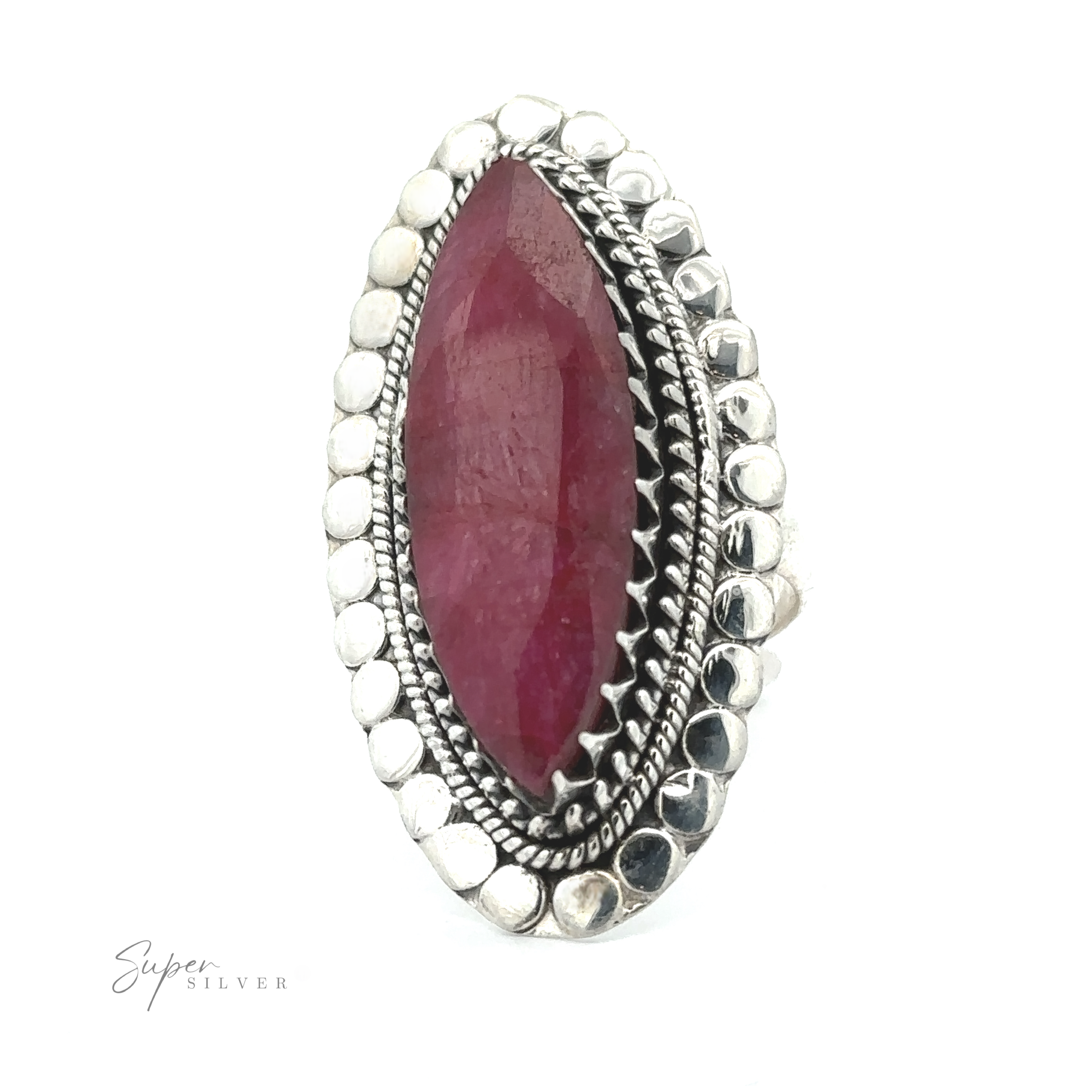 An oval-shaped ring with a large, maroon gemstone set in a detailed silver band surrounded by smaller decorative silver elements. The band is inscribed with "Super Silver," making the Statement Marquise Shaped Gemstone Ring the perfect piece for those who appreciate bohemian jewelry.