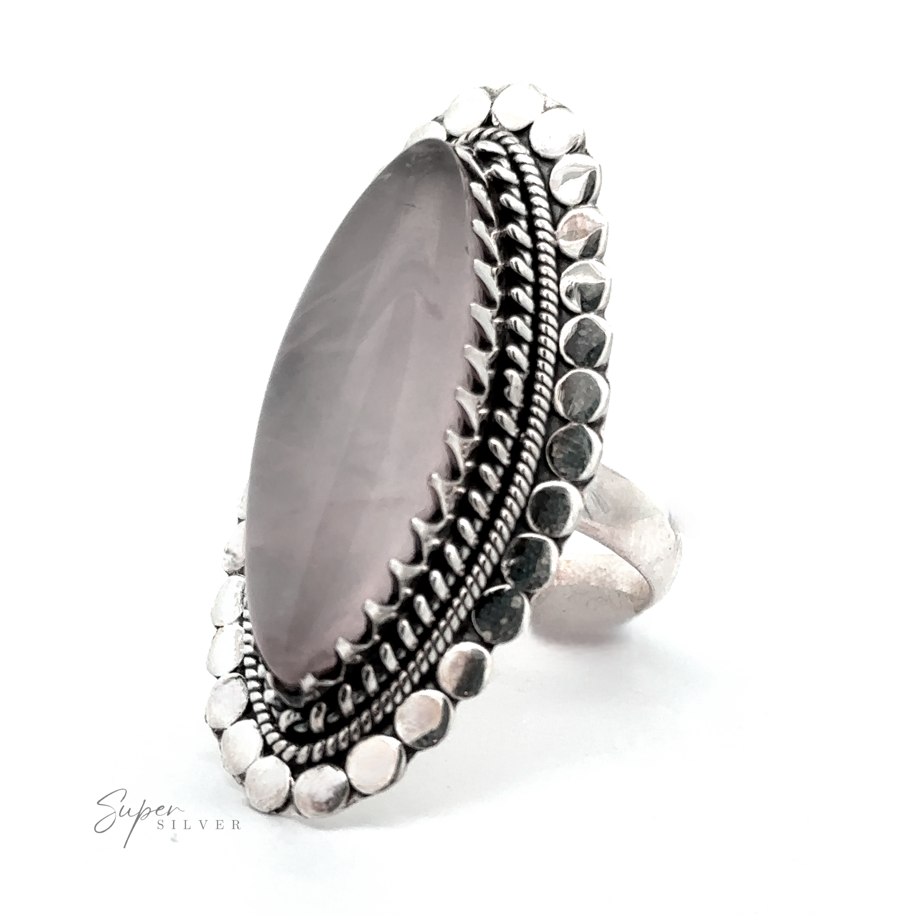 A Statement Marquise Shaped Gemstone Ring with intricate metalwork around the band is pictured against a white background, exuding a touch of Bohemian Jewelry charm. The logo "Super Silver" is visible in the bottom left corner.
