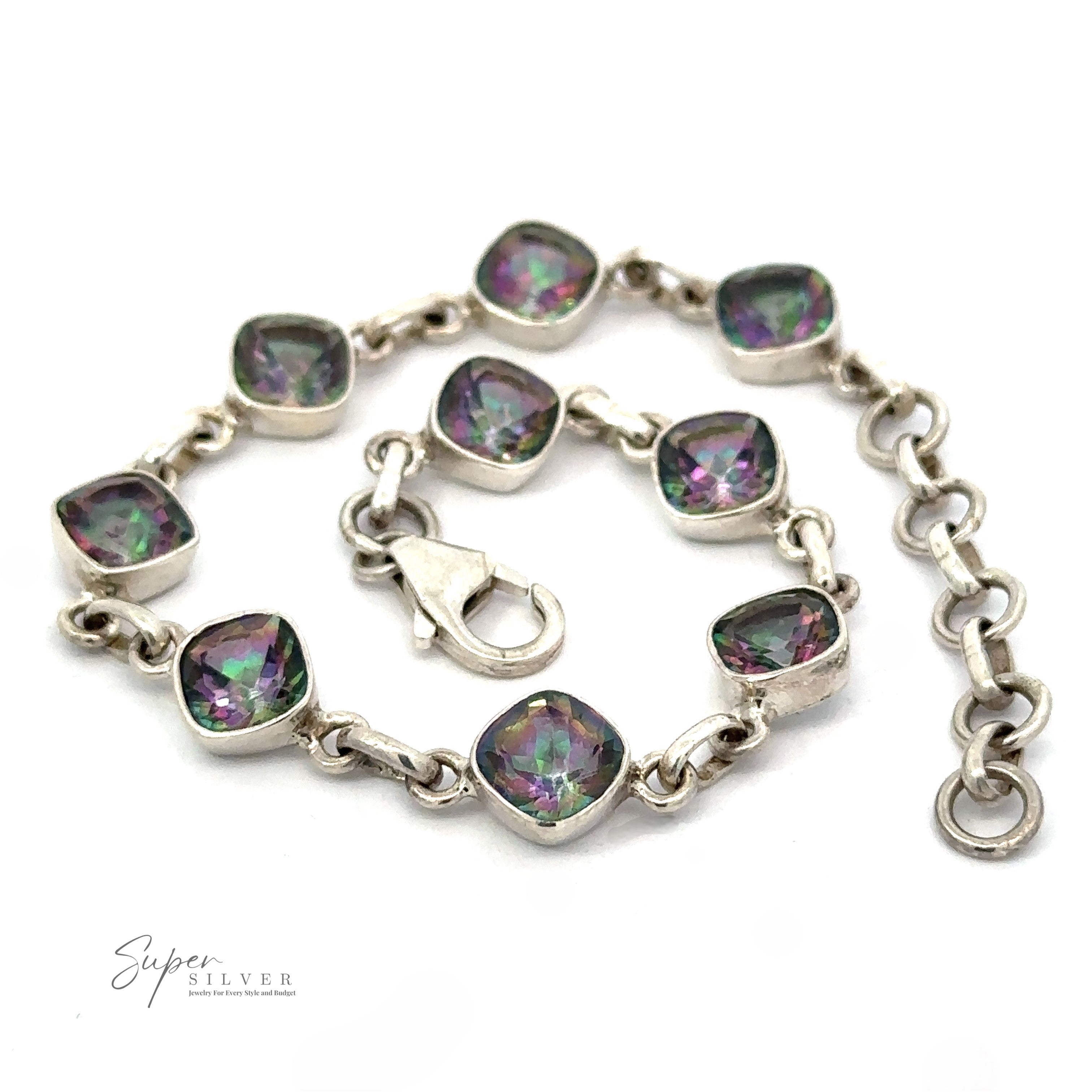 A Rainbow Mystic Topaz Diamond Link Bracelet featuring purple and green gem-like stones in square settings with a lobster clasp and an adjustable chain.