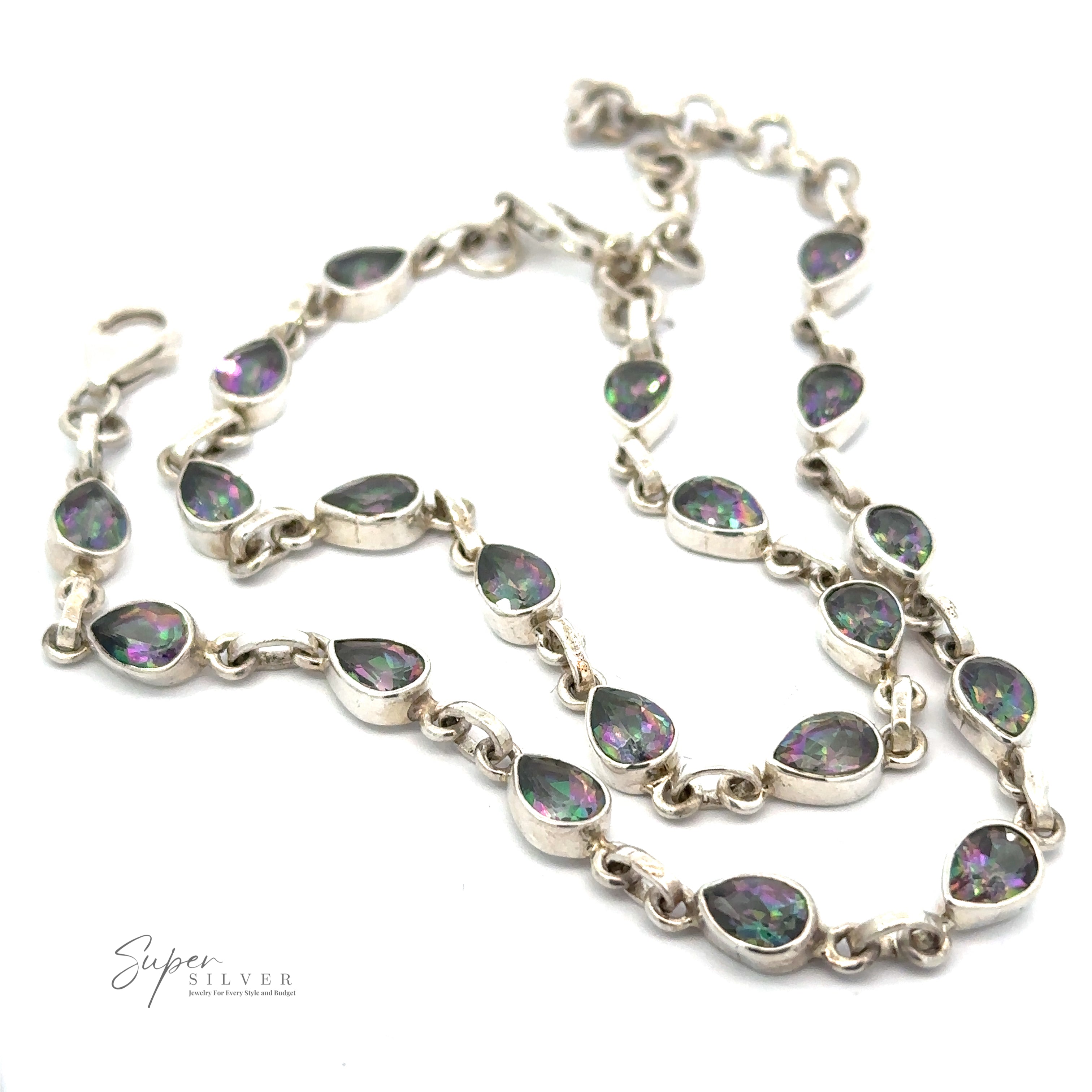 A Rainbow Mystic Topaz Teardrop Shape Link Bracelet featuring linked teardrop-shaped pendants with multicolored gemstones. The bracelet is arranged in a semi-circle on a white background. "Super Silver" logo is visible in the bottom left.